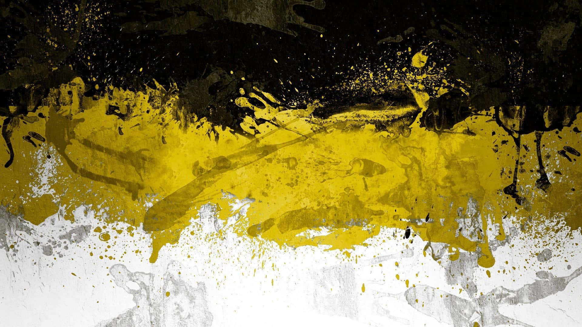 A Yellow And Black Paint Splatter