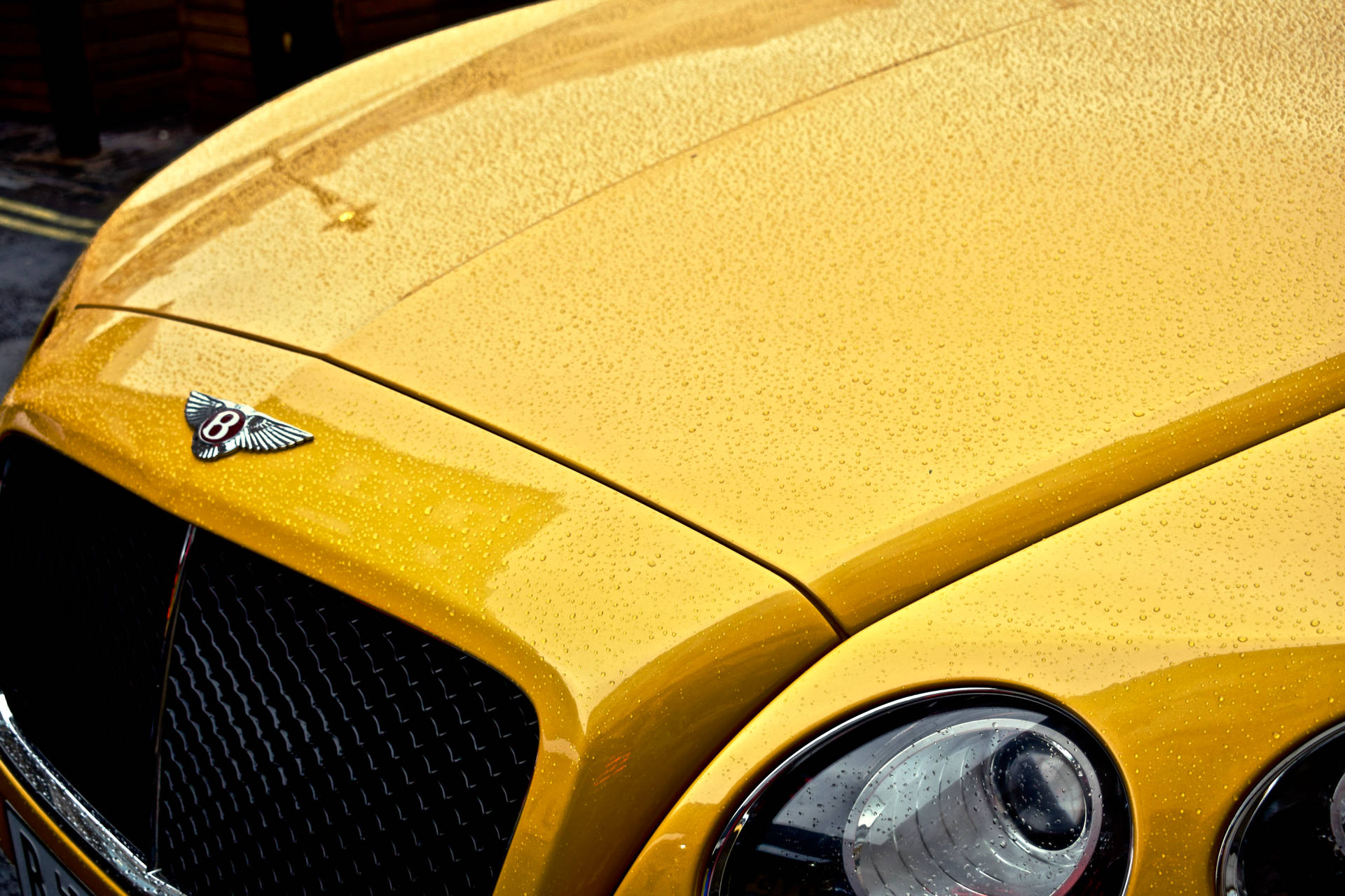 Yellow Bentley Under The Rain Wallpaper