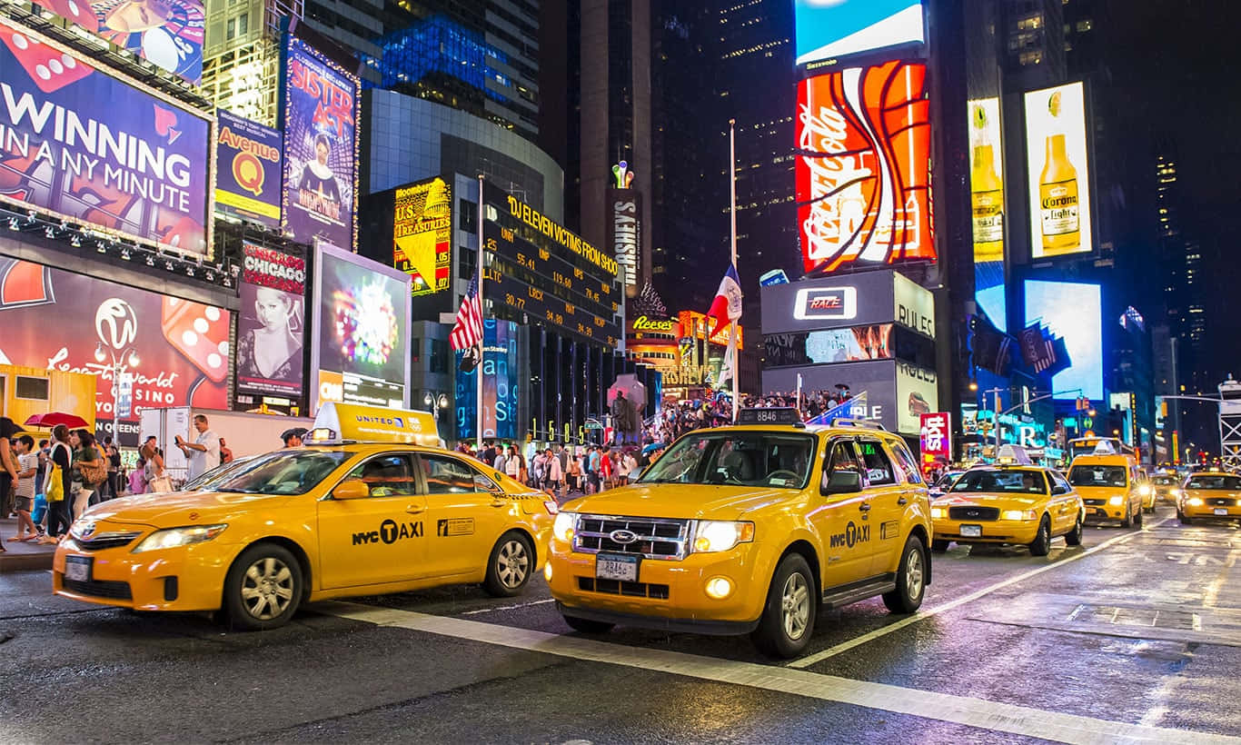 Vibrant Yellow Cab in a bustling city Wallpaper