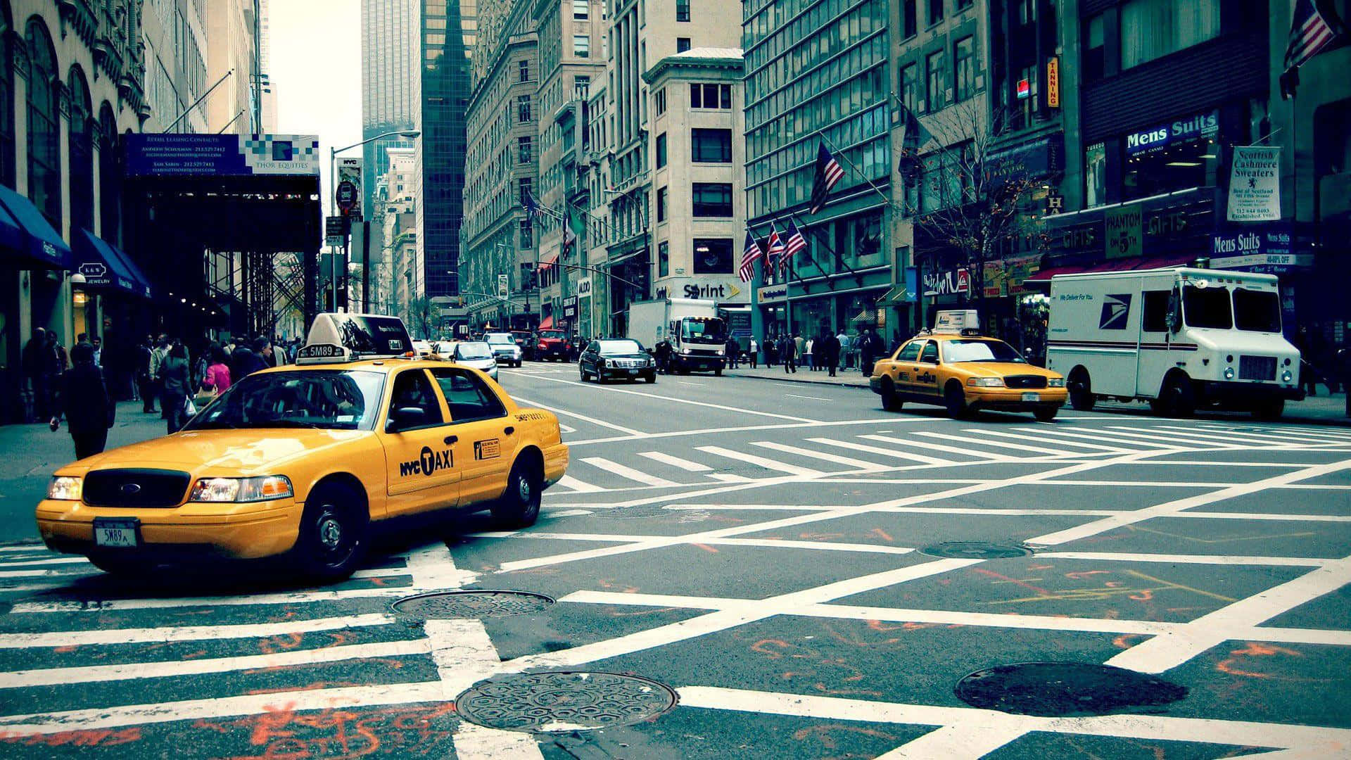 Vibrant Yellow Cab in the City Streets Wallpaper