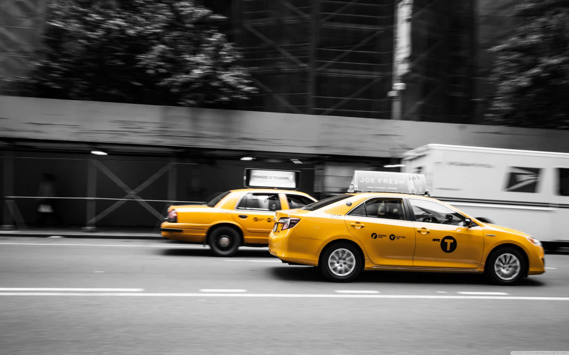 Yellow Cab Parked in City Street Wallpaper