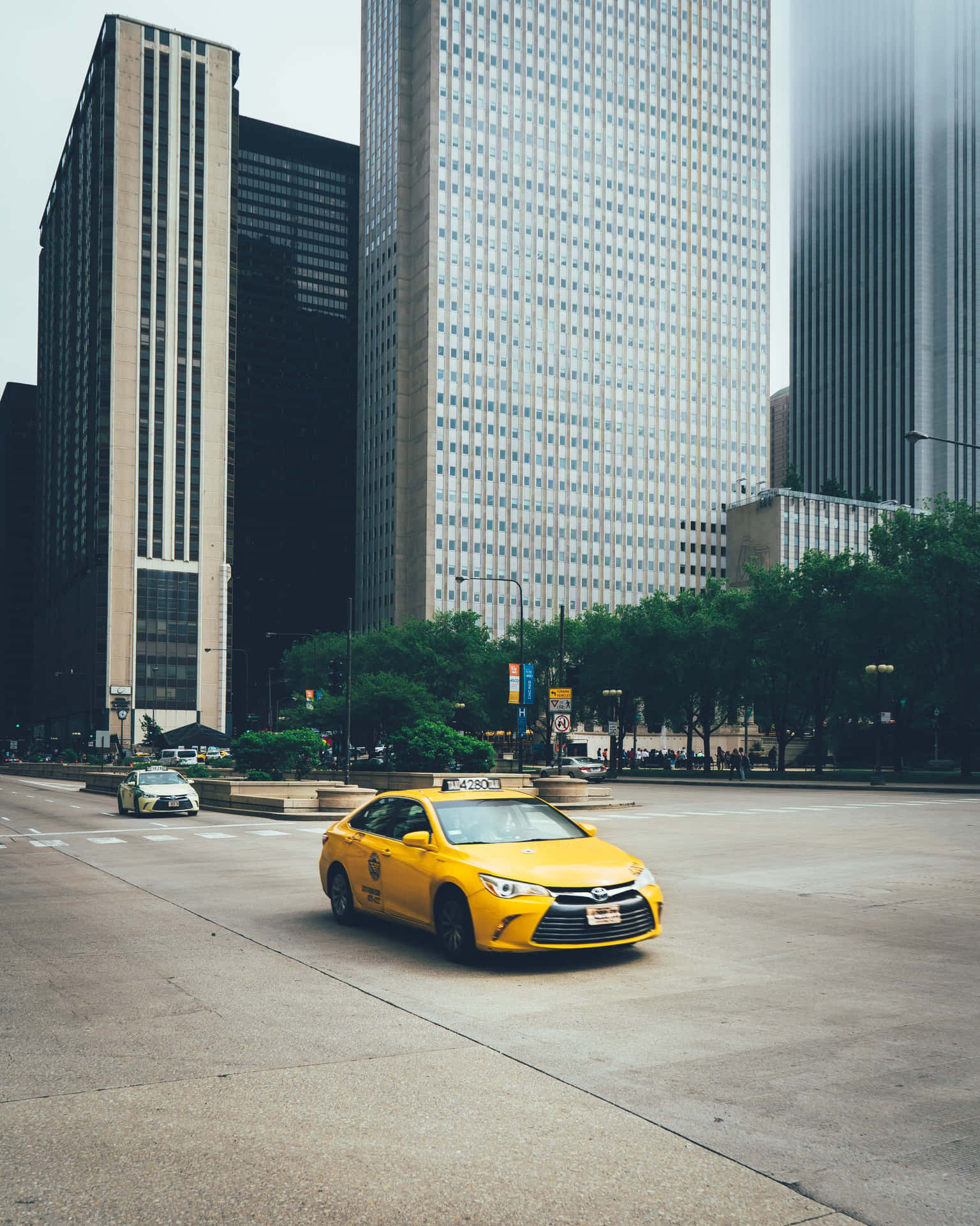 Yellow Cab in the city streets Wallpaper