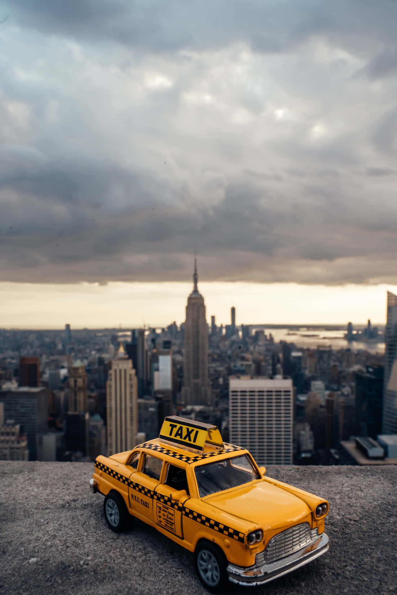 Yellow Cab in Urban City Wallpaper