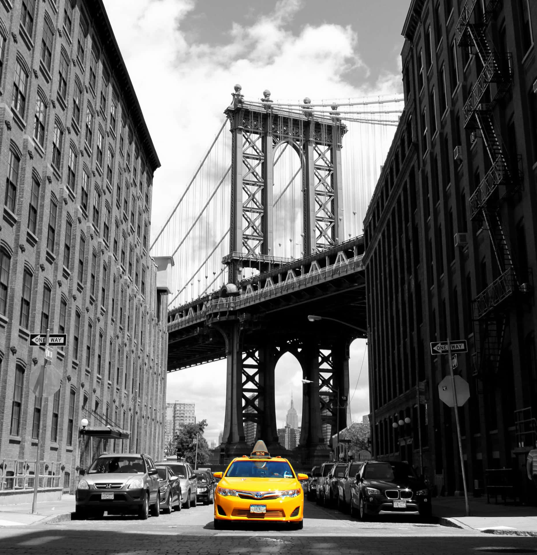 Busy city street with iconic Yellow Cab Wallpaper