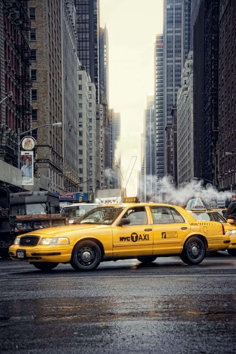 Yellow Cab On A City Street Wallpaper