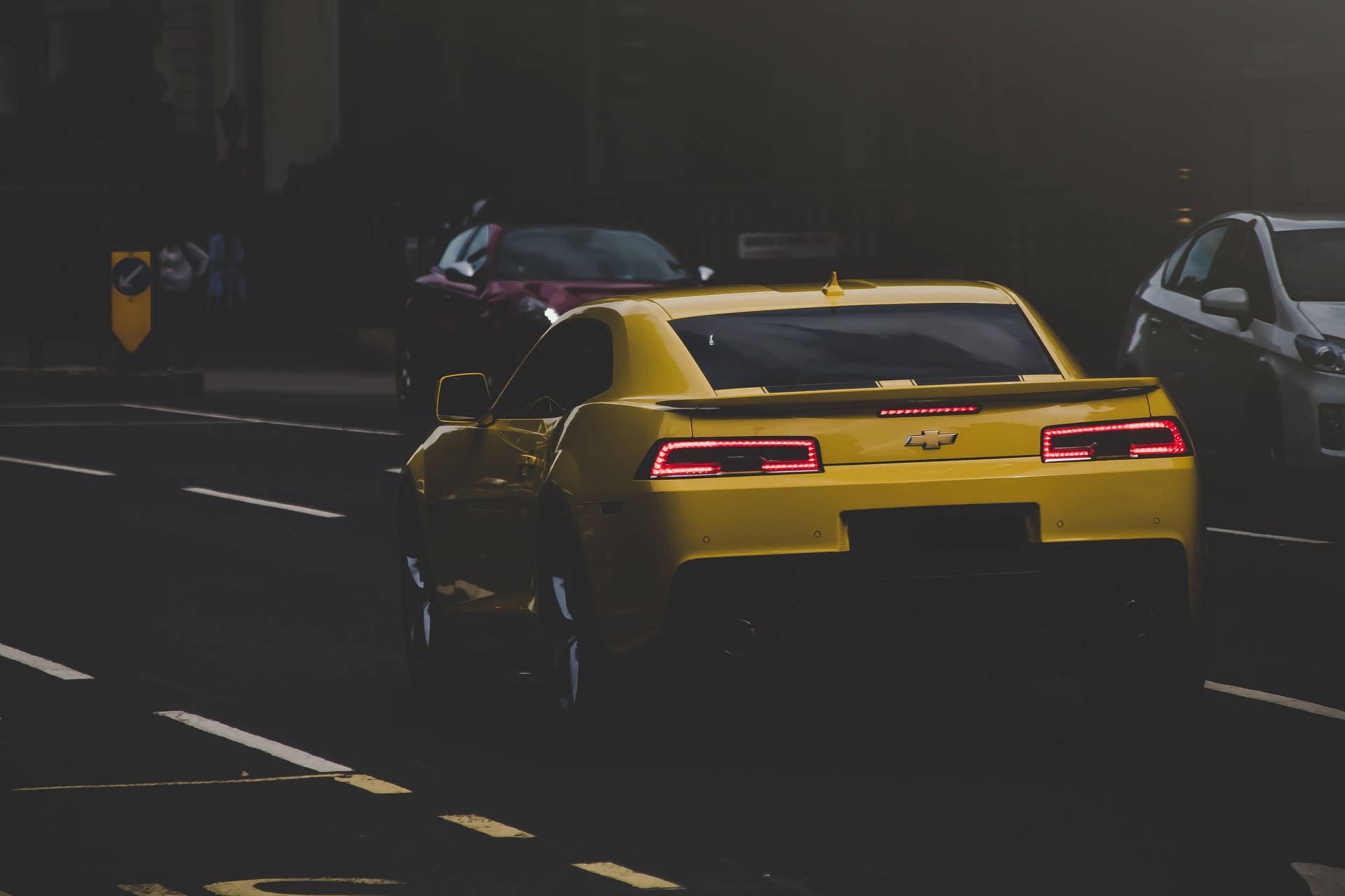 Yellow Chevrolet Car On Road
