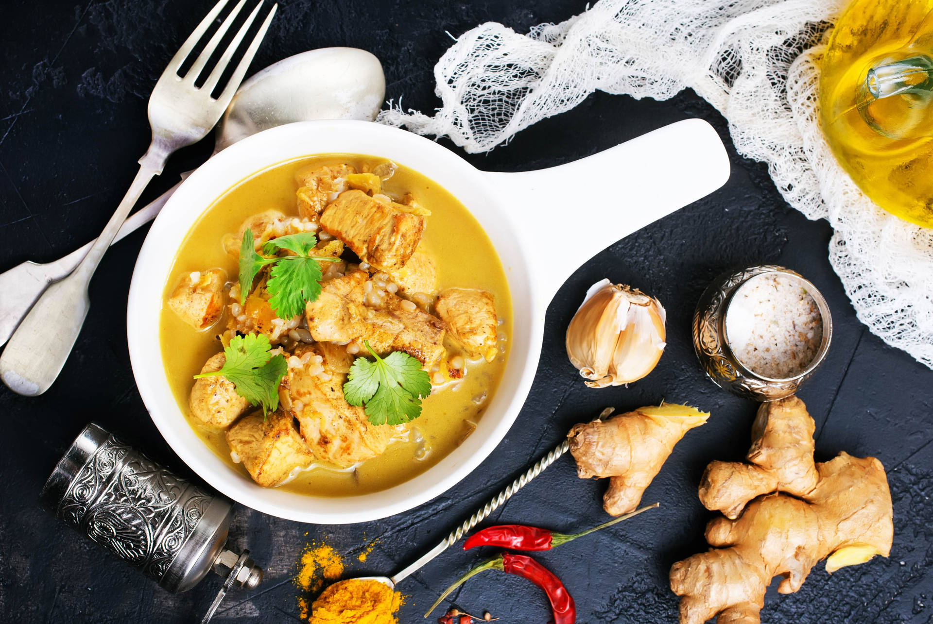 Yellow Curry In A Pot And Spices Wallpaper