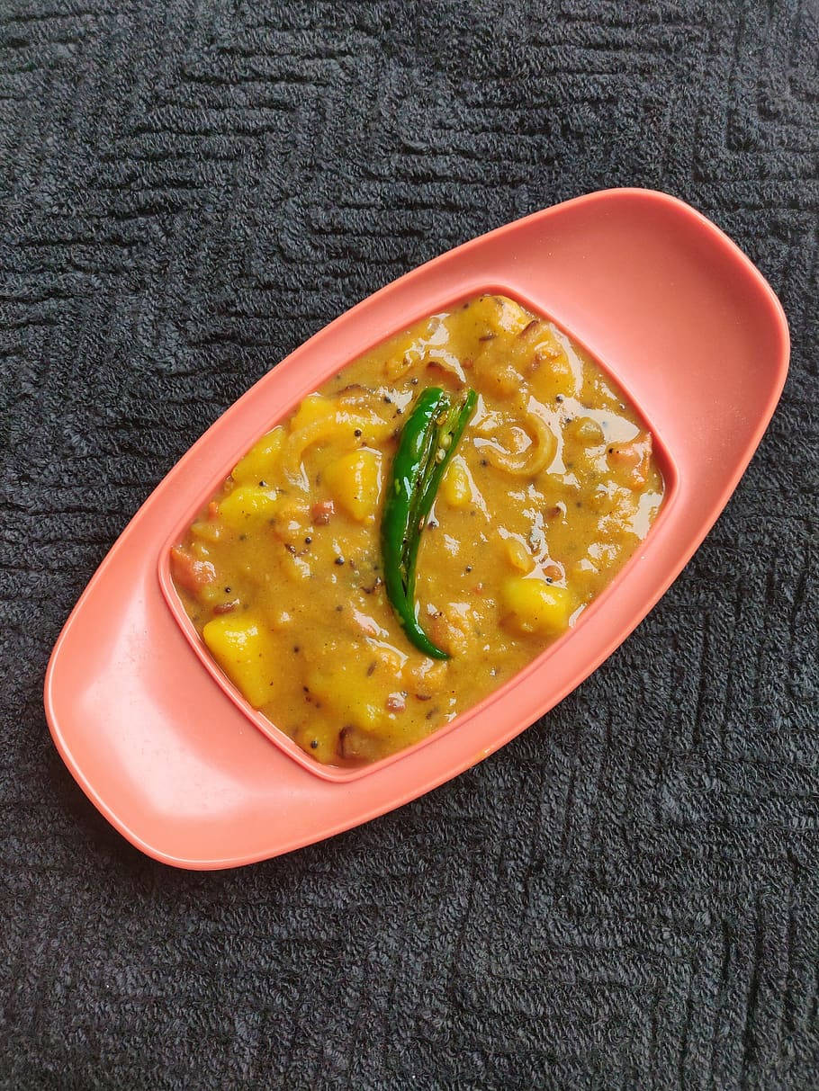 Yellow Curry Topped With Green Chili Wallpaper