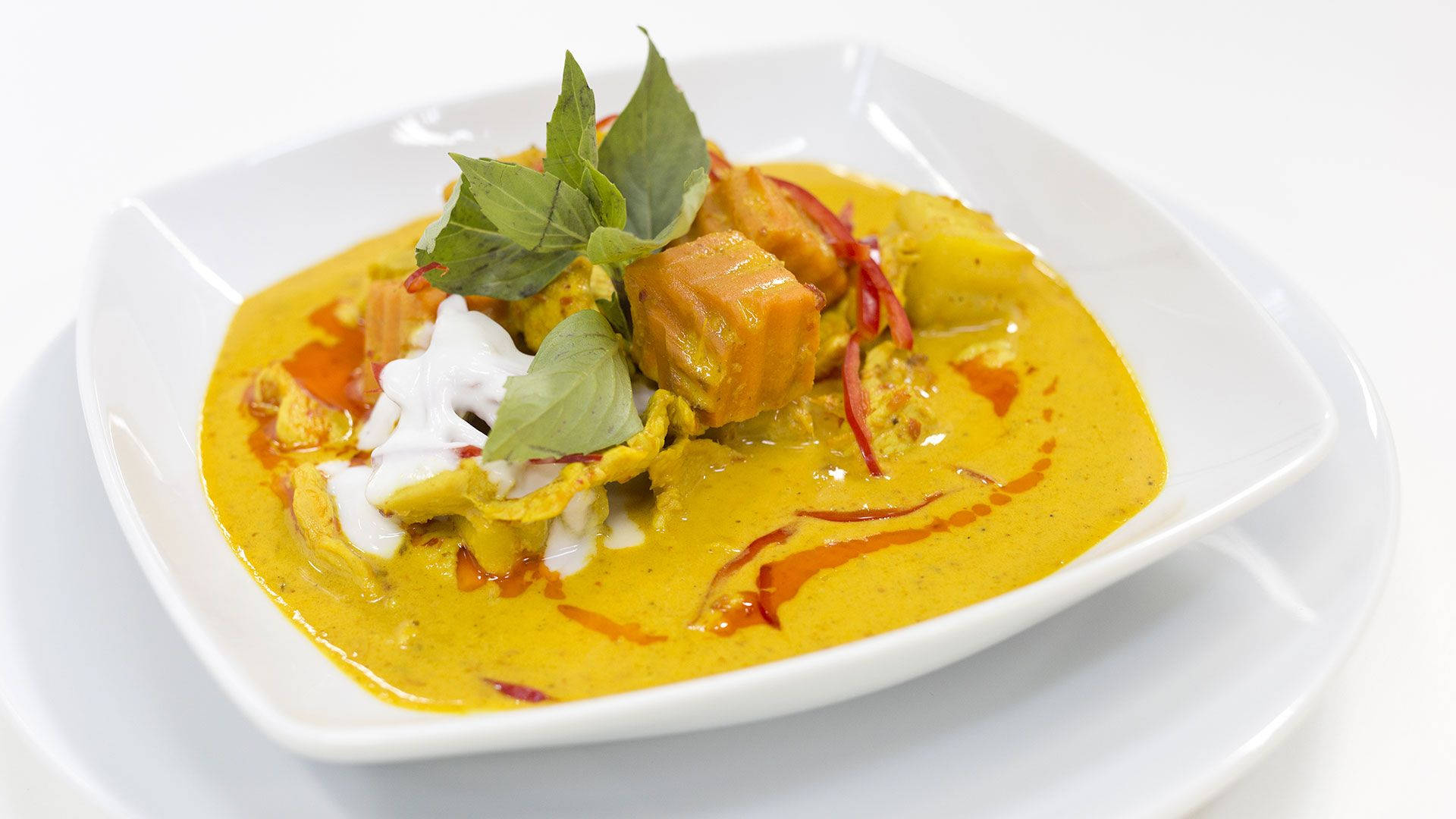 Yellow Curry With Herbs And Cream Wallpaper