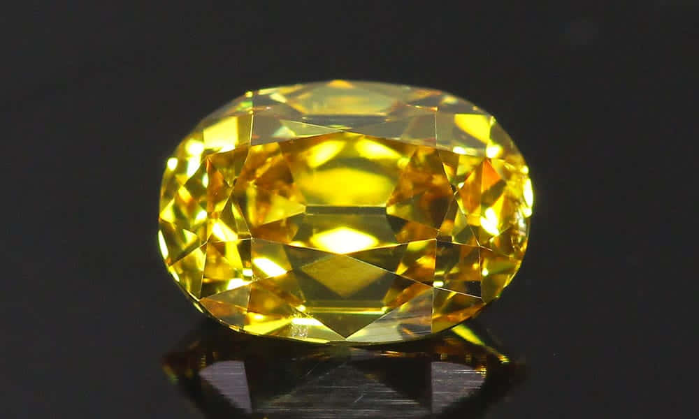 Caption: Brilliant Yellow Diamond Glistening in Sunlight Wallpaper