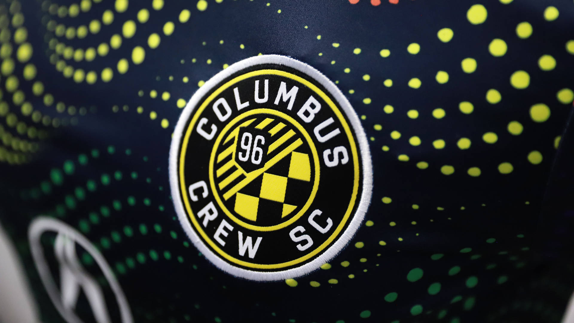 Yellow Dot Design In The Logo Of Columbus Crew Background