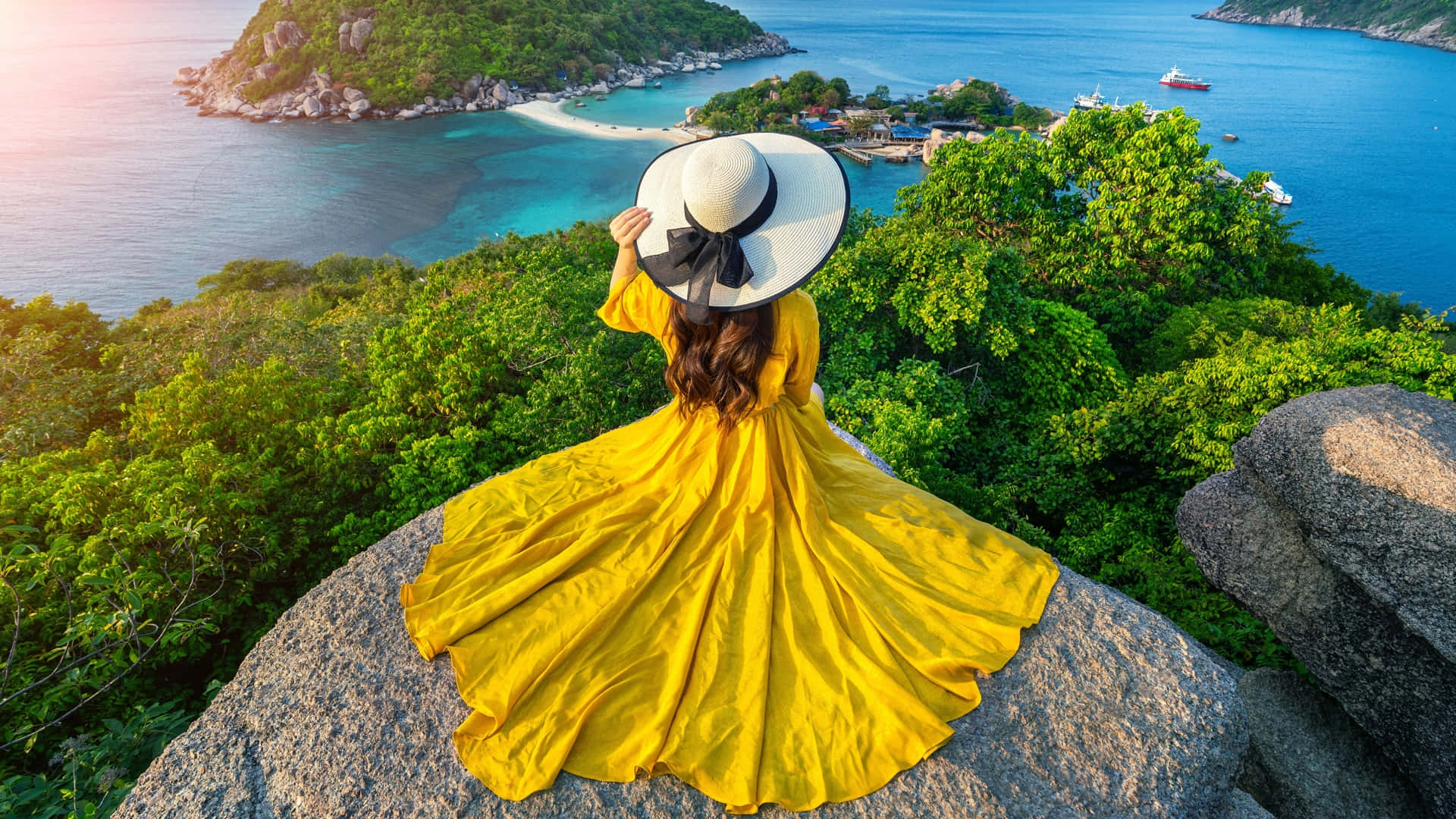 Elegant Woman in Vibrant Yellow Dress Wallpaper