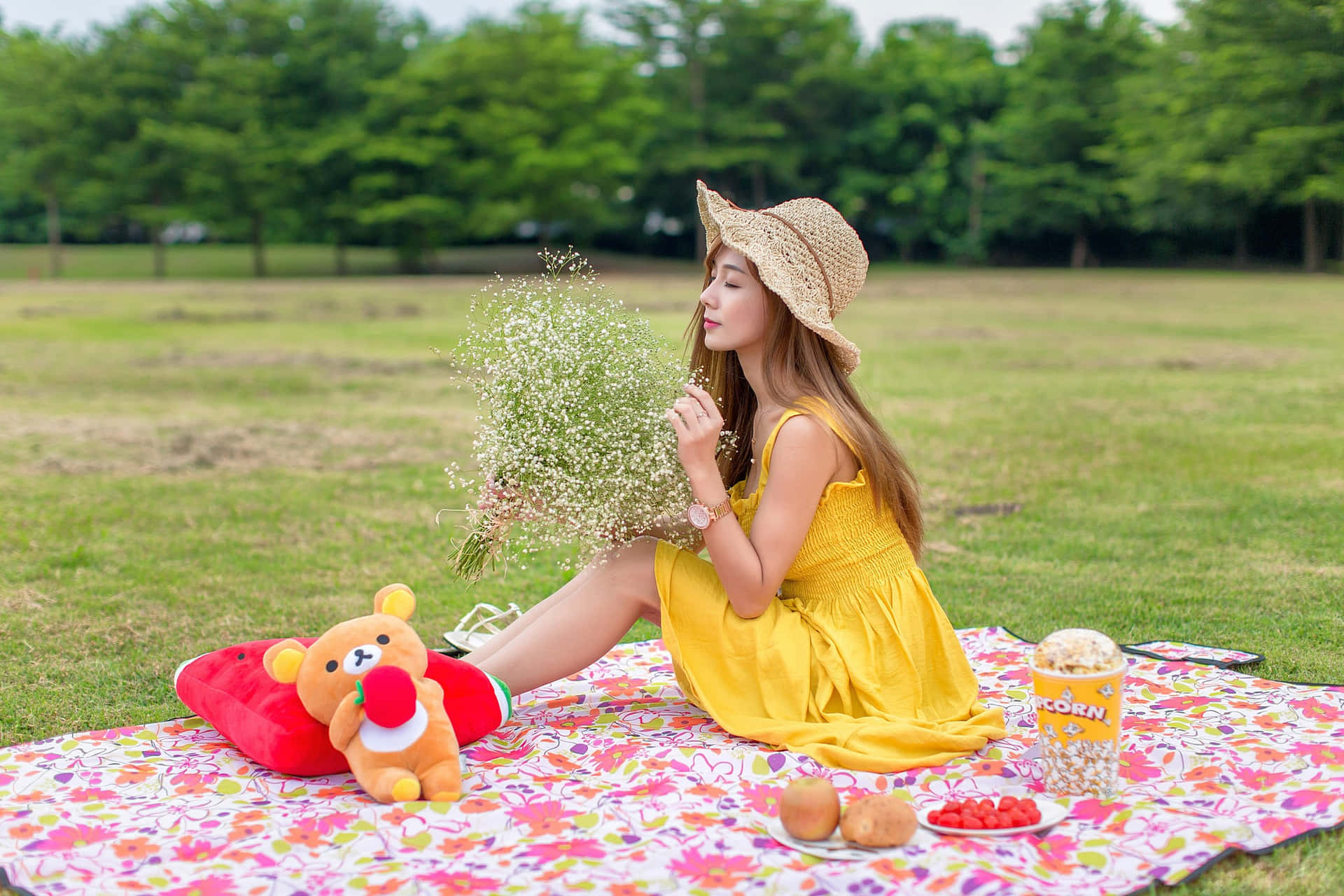 Stylish Woman in a Vibrant Yellow Dress on a Sunny Day Wallpaper