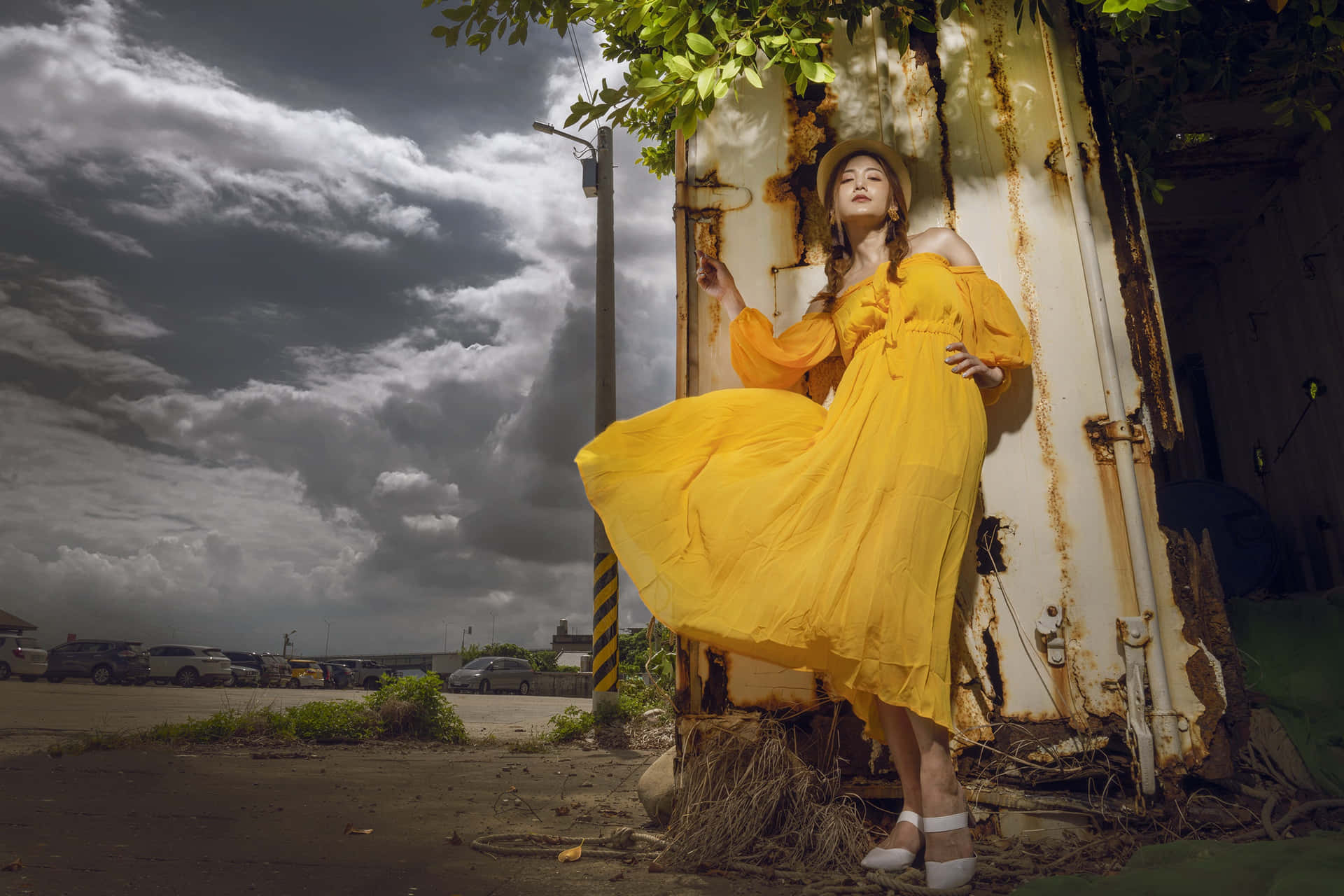 Elegant woman in a vibrant yellow dress Wallpaper