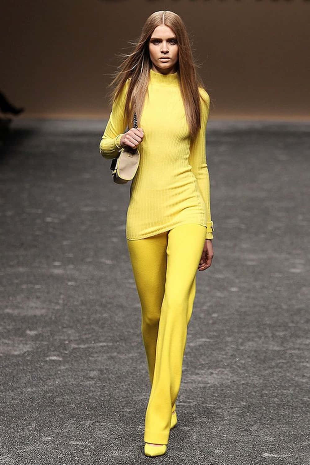 Vibrant and Chic Yellow Fashion Outfit Wallpaper