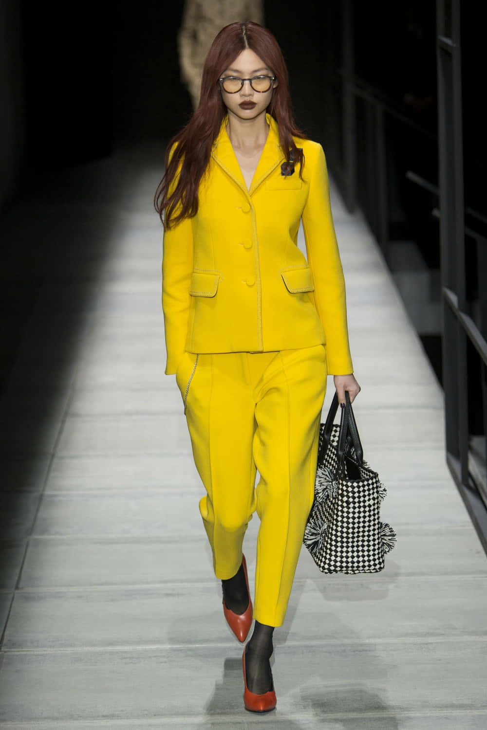 Striking Yellow Outfit on Fashion Model Wallpaper