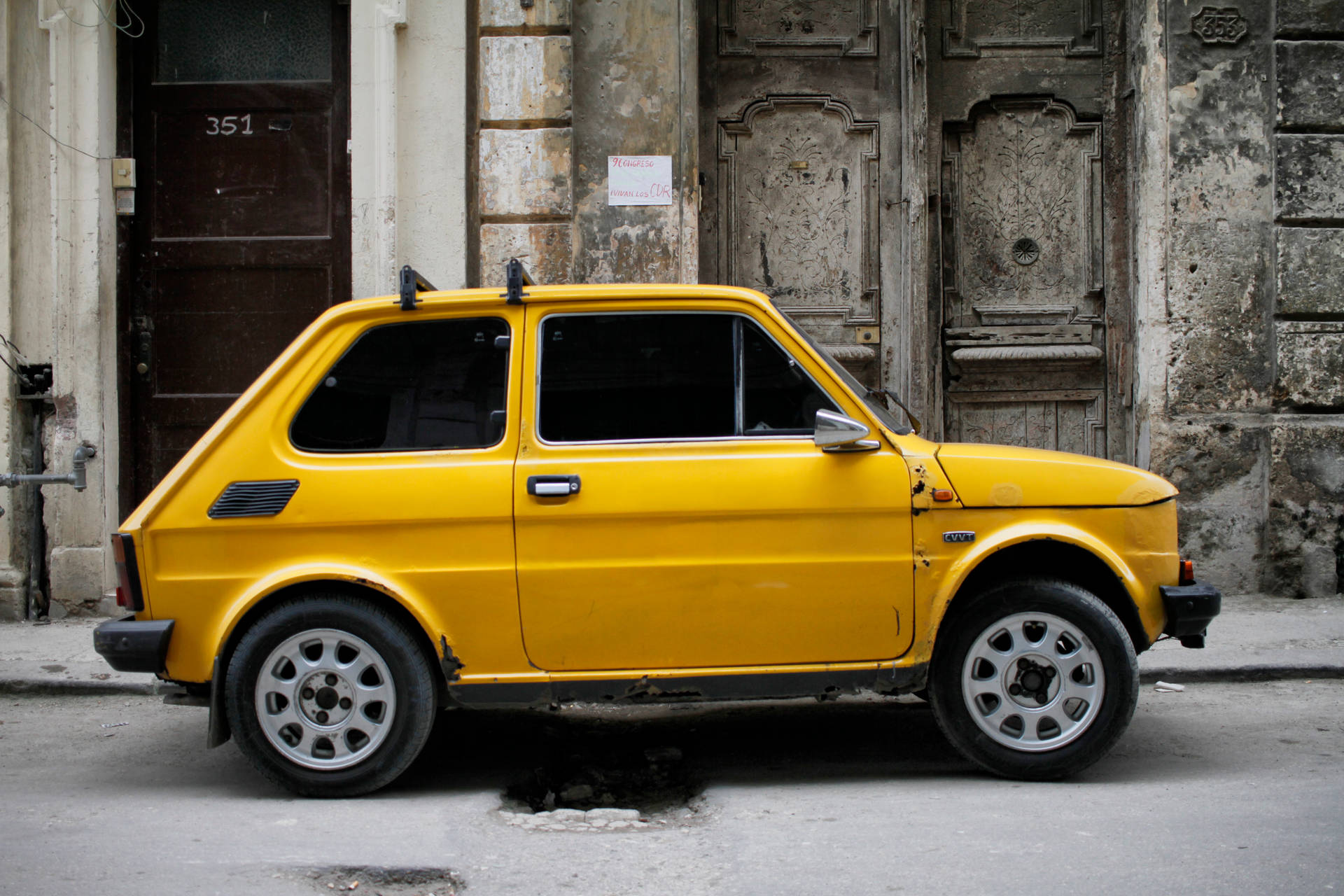 Yellow Fiat 126 In Cuba Wallpaper