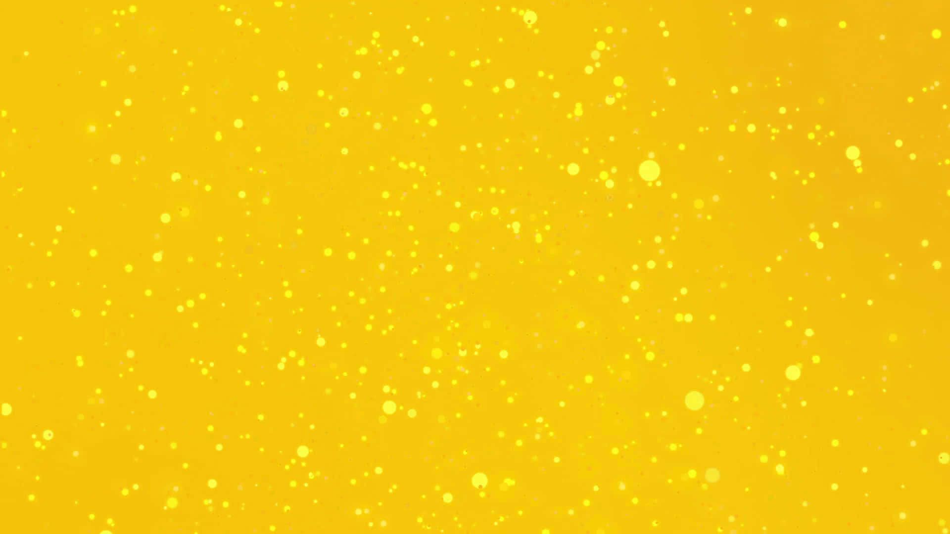 Yellow Background With Drops Of Water Wallpaper