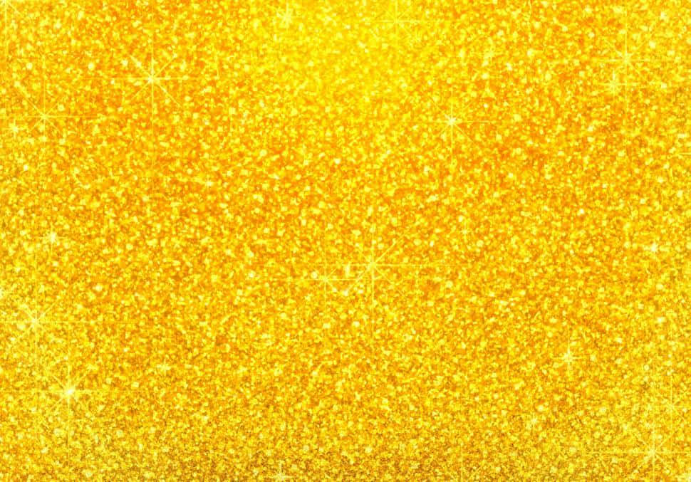 A Golden Glitter Background With Stars Wallpaper
