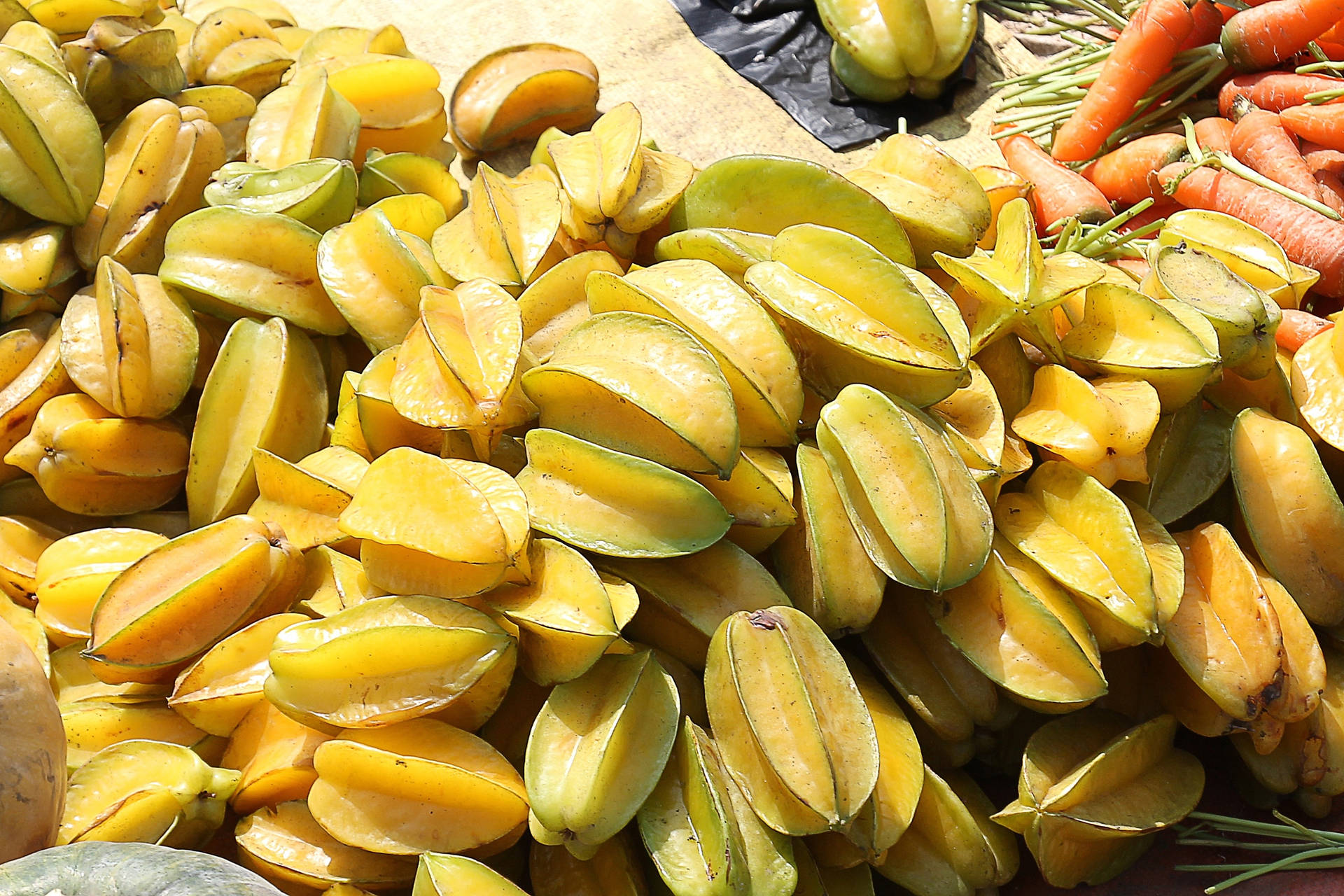 Yellow Golden Carambola On The Ground Wallpaper