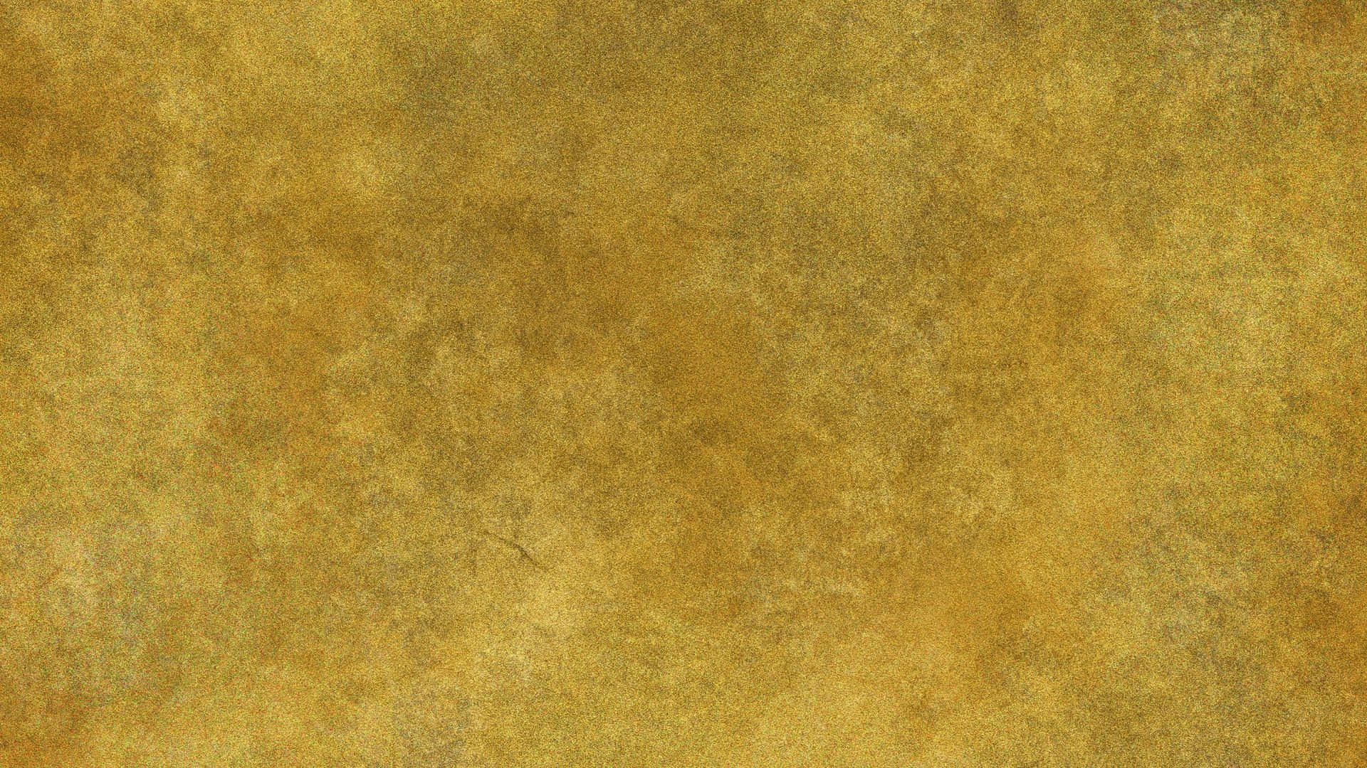 A Gold Colored Background With A Lot Of Scratches Wallpaper