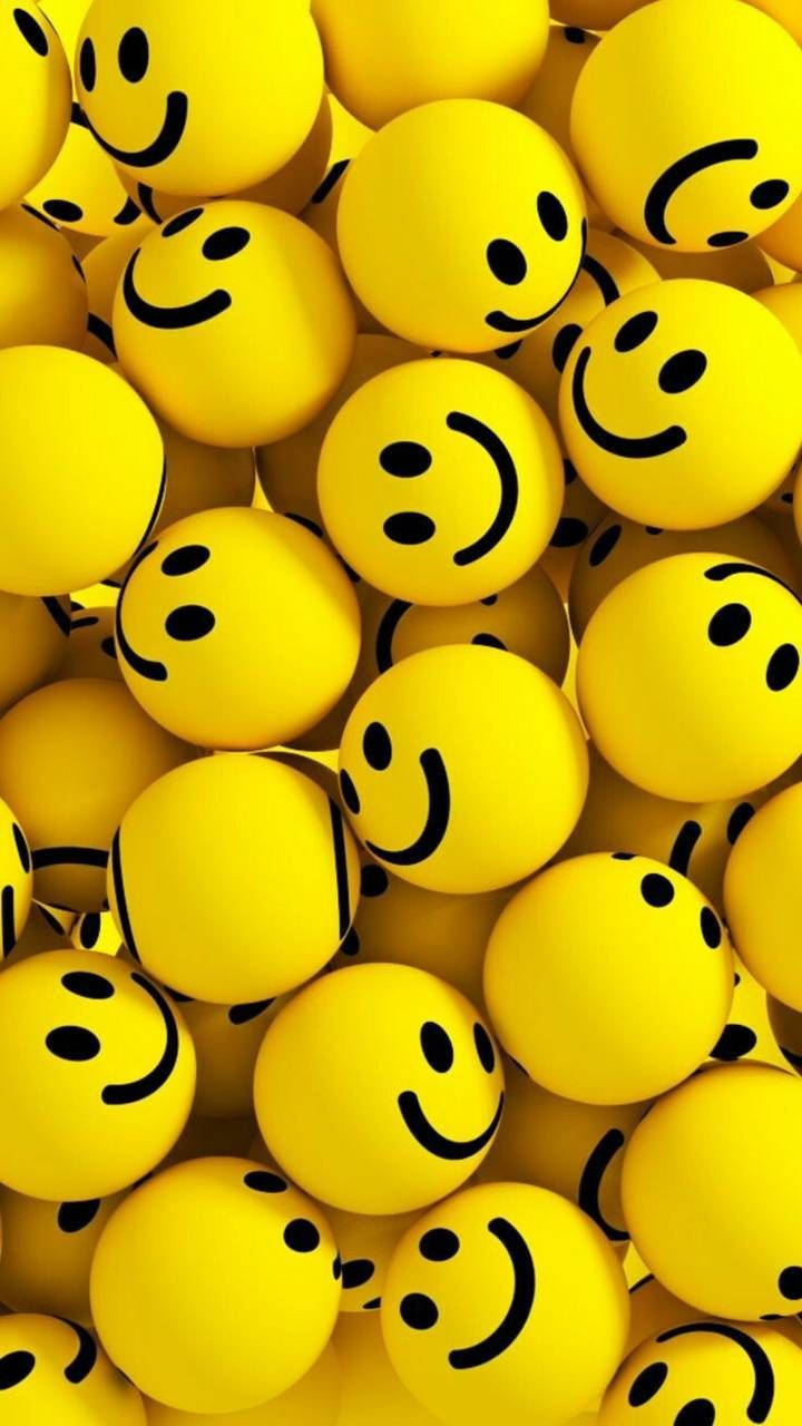 Yellow Happy Smiley Face Stress Balls Wallpaper