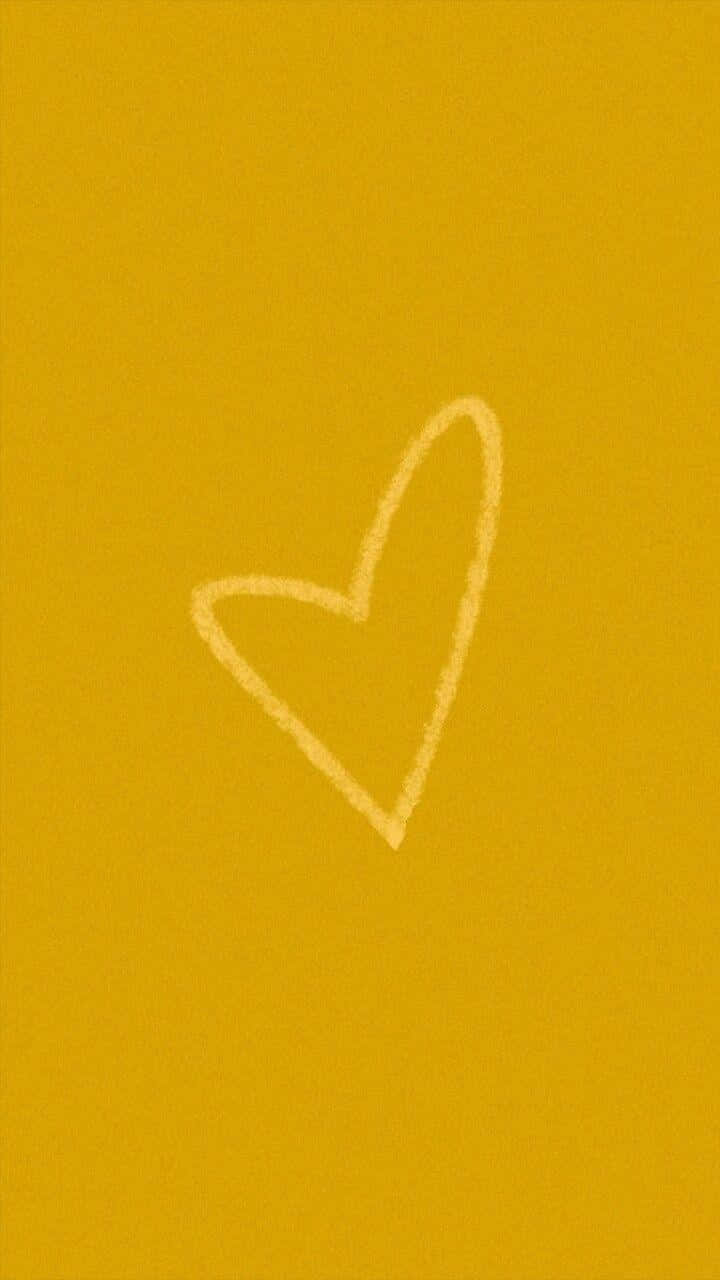 Golden Yellow Heart on a Black Background Wallpaper