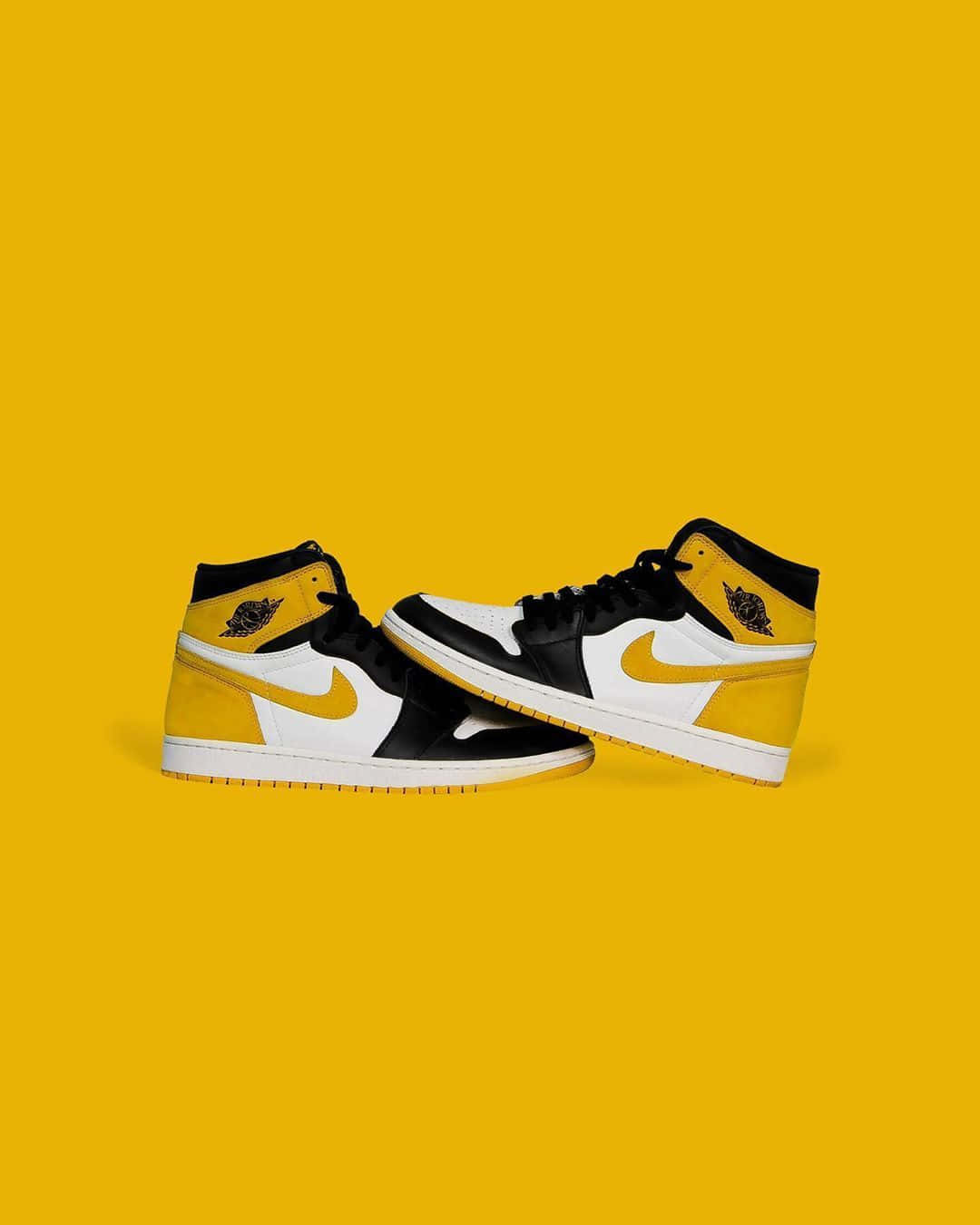 Nyfrizet ud af boksen, den ikoniske gul og sorte Jordan. Wallpaper