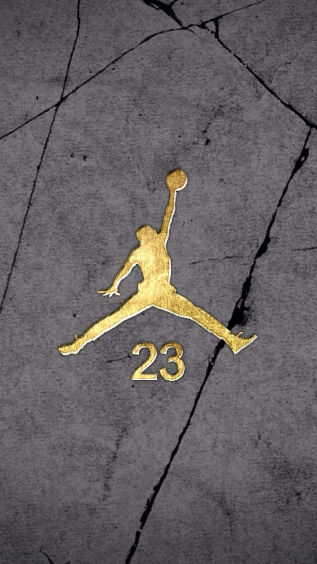 A Gold Jordan Logo Is On The Ground Wallpaper
