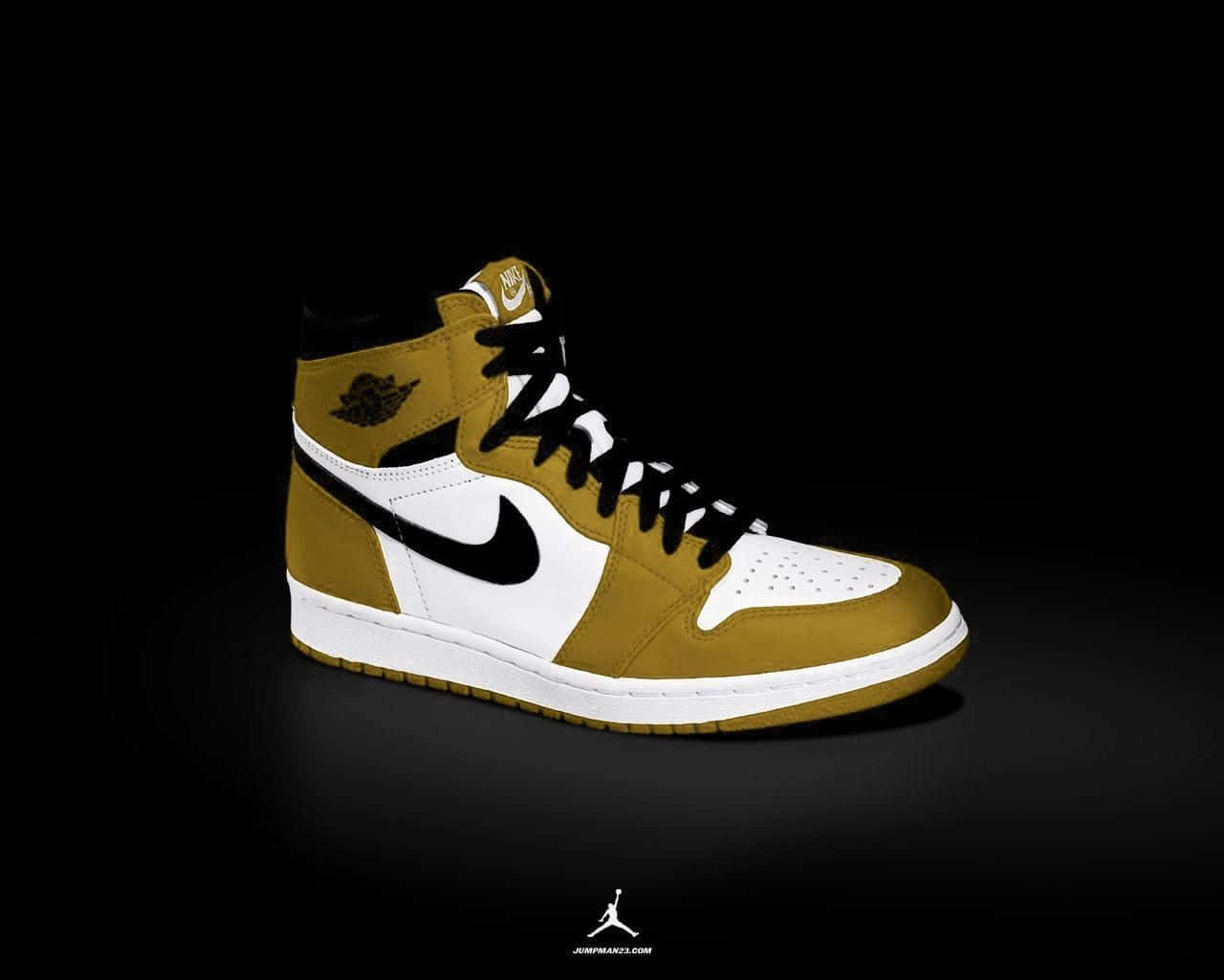 A Gold And White Jordan Shoe On A Black Background Wallpaper