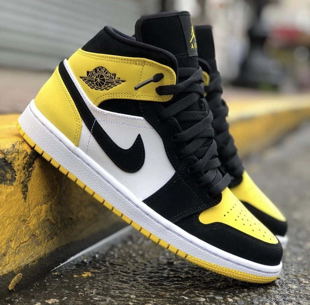 Yellow Jordan Toe Cap Black Wallpaper