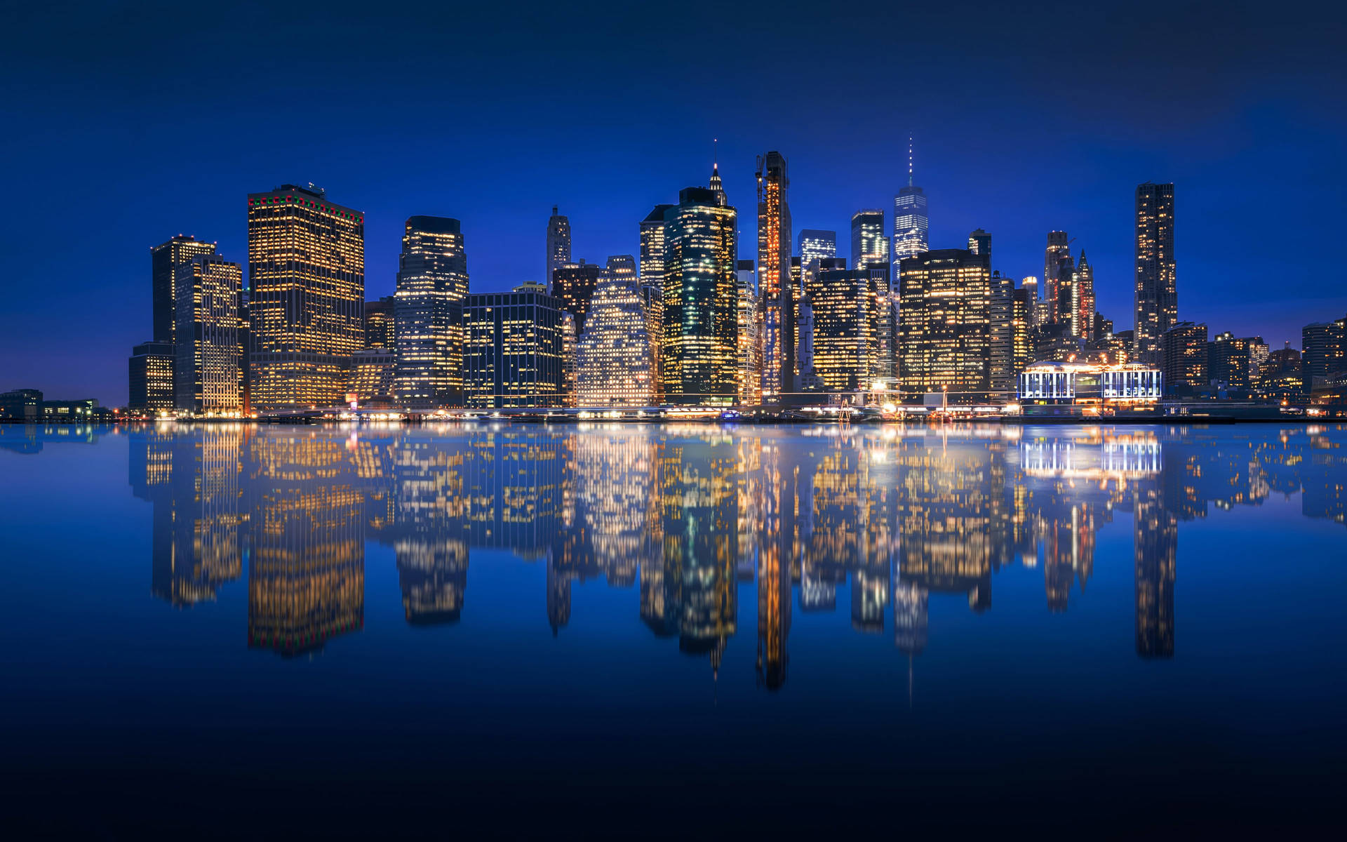 Yellow Lit Buildings Water Reflection New York 4k Wallpaper