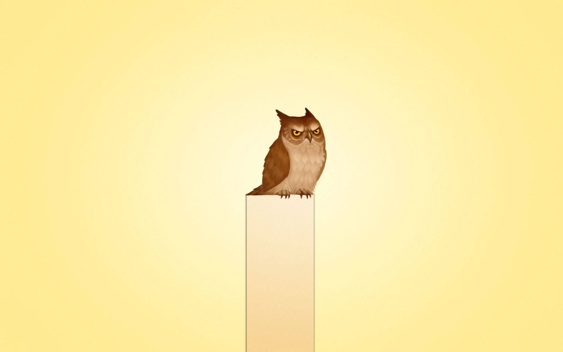 Staring off into the distance, this deceptively angry-looking yellow owl stands atop a branch. Wallpaper