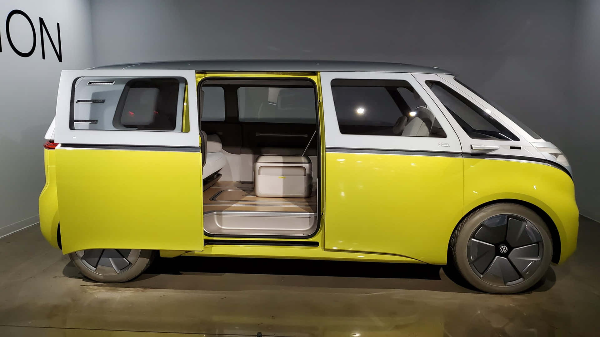 Yellow Modern Electric Van Petersen Automotive Museum Wallpaper