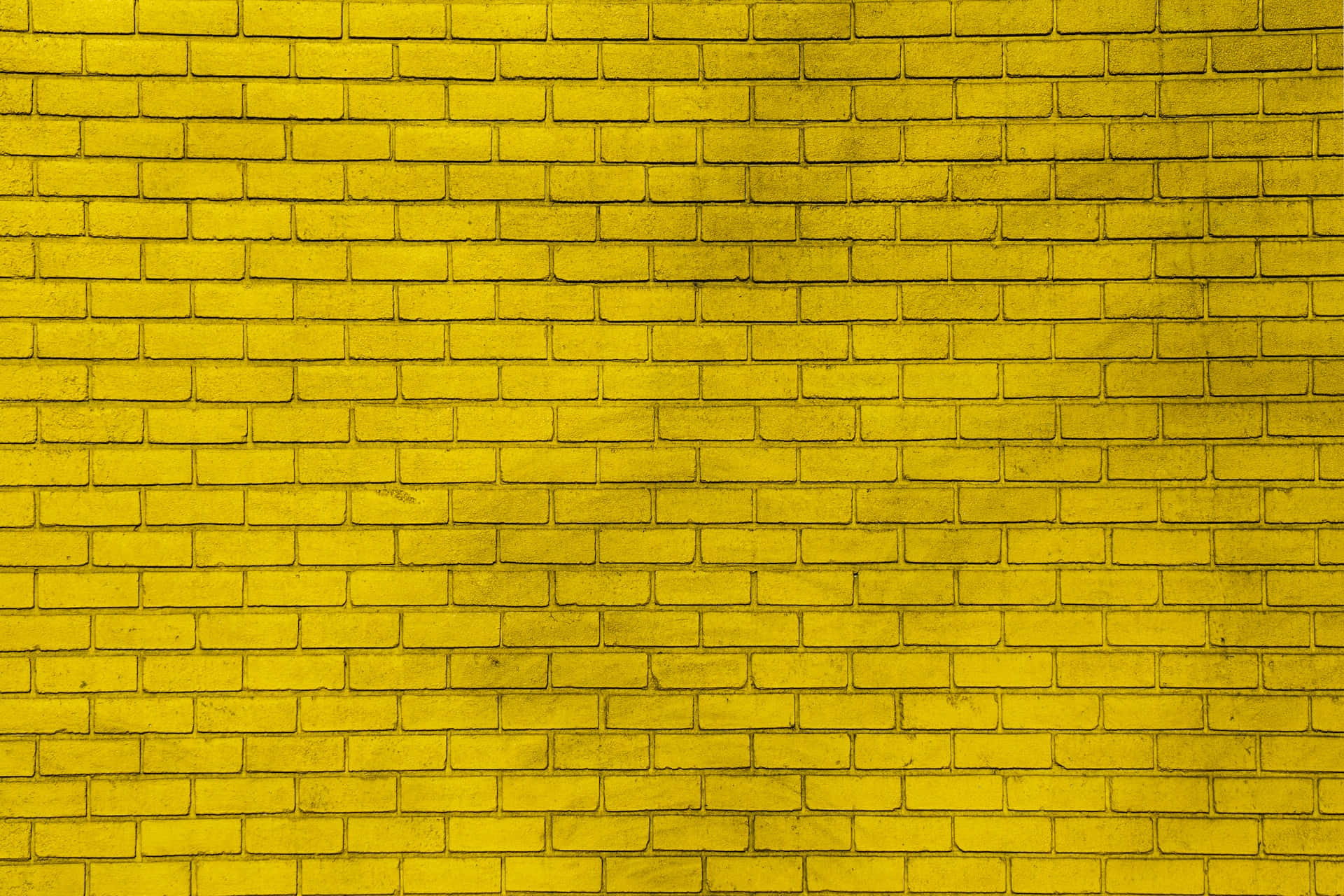 Patróngeométrico Vibrante En Color Amarillo. Fondo de pantalla
