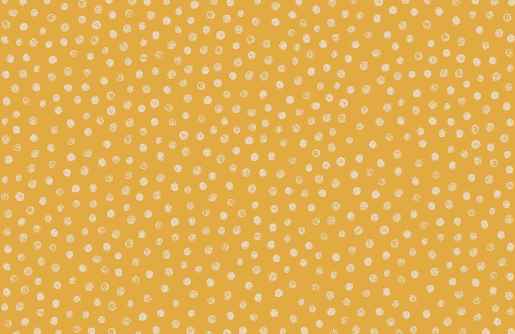 A vibrant yellow polka dot wallpaper backdrop Wallpaper