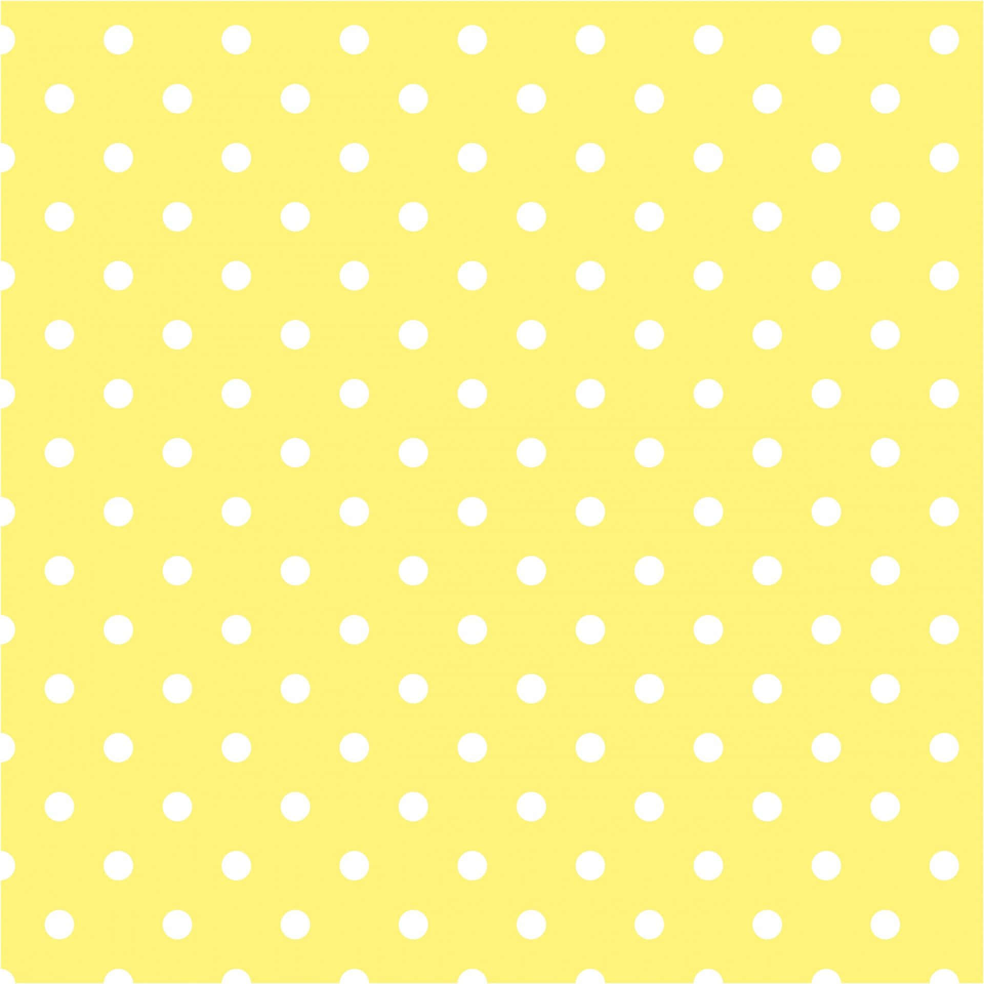 Caption: Vibrant Yellow Polka Dot Background Wallpaper