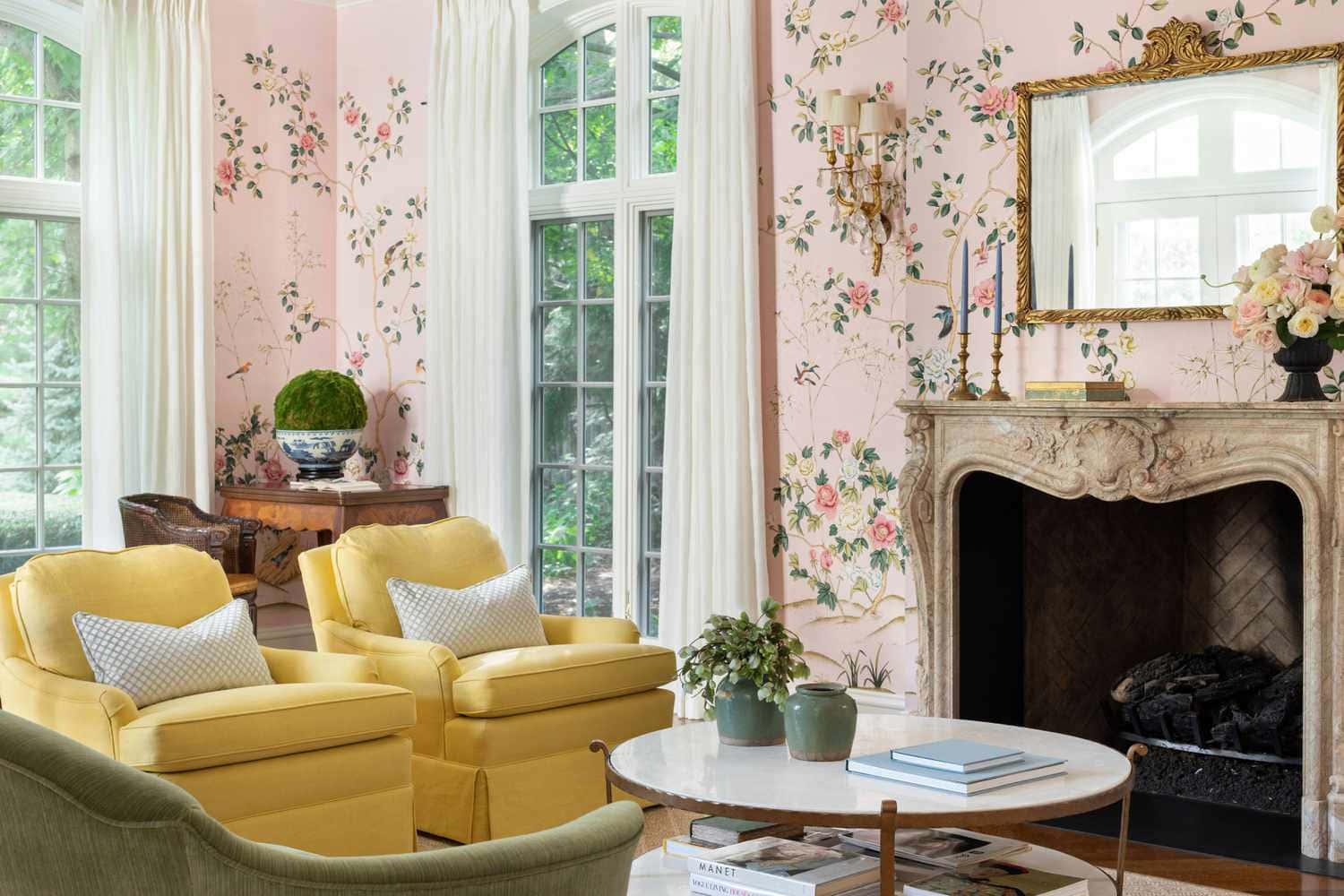 Elegant Yellow Couch Against a Floral Accent Wall Wallpaper