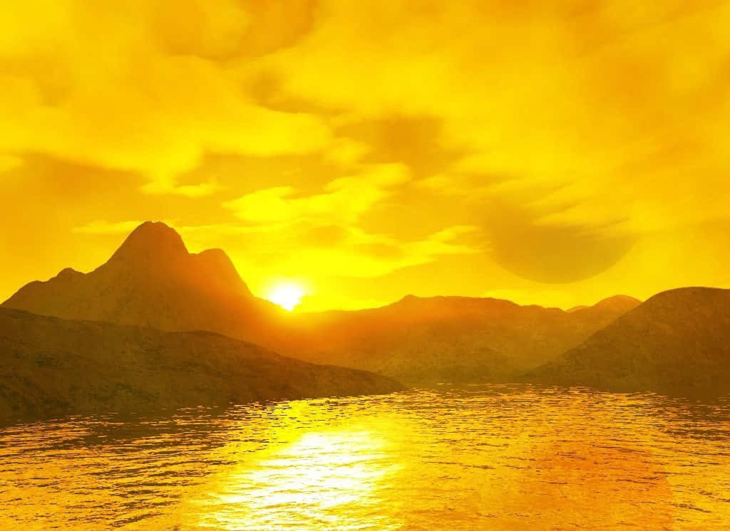 A Vibrant Yellow Sky During Sunset Wallpaper