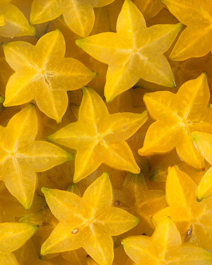 Yellow Sliced Star Fruits Wallpaper
