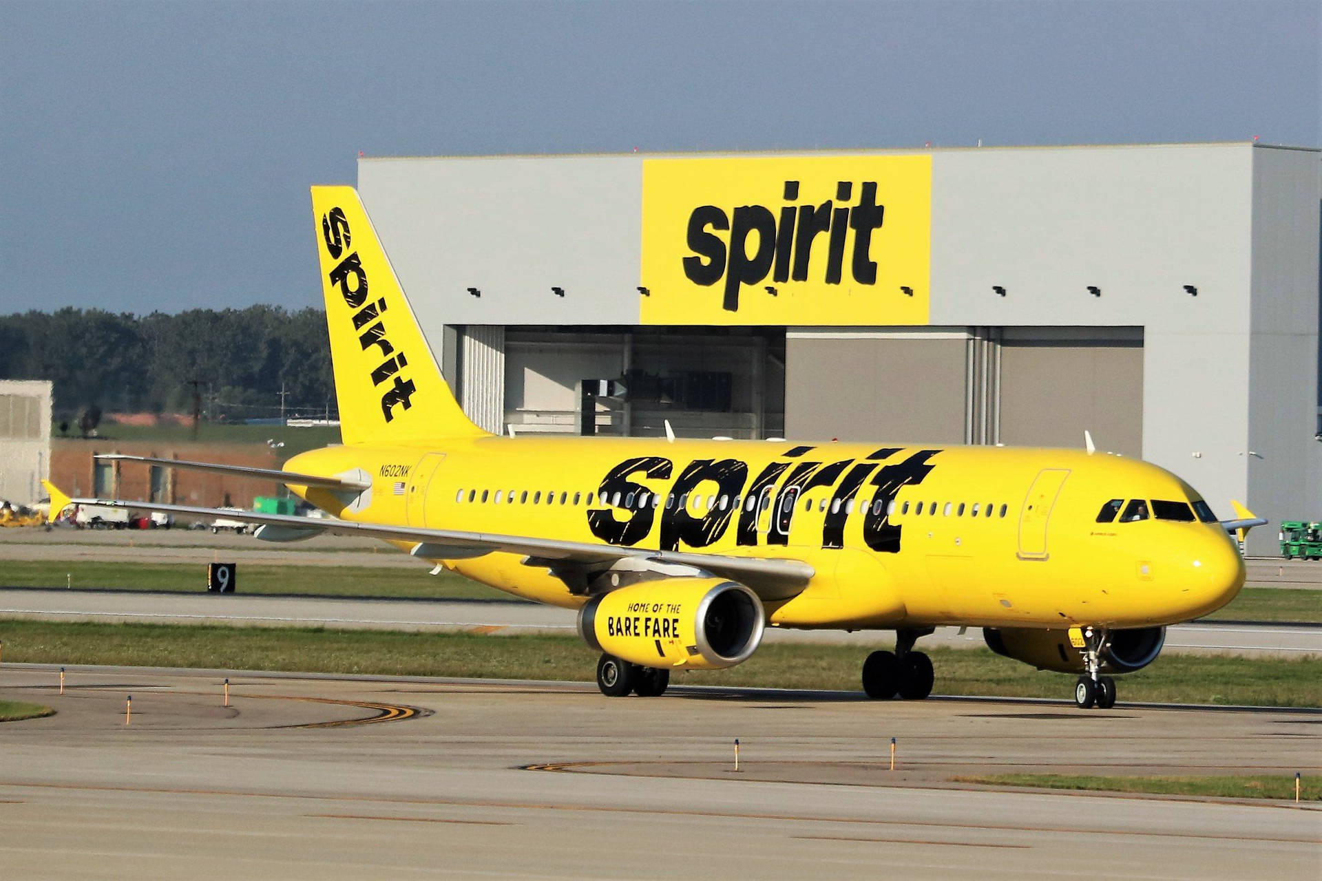 Yellow Spirit Airlines Airplane Background