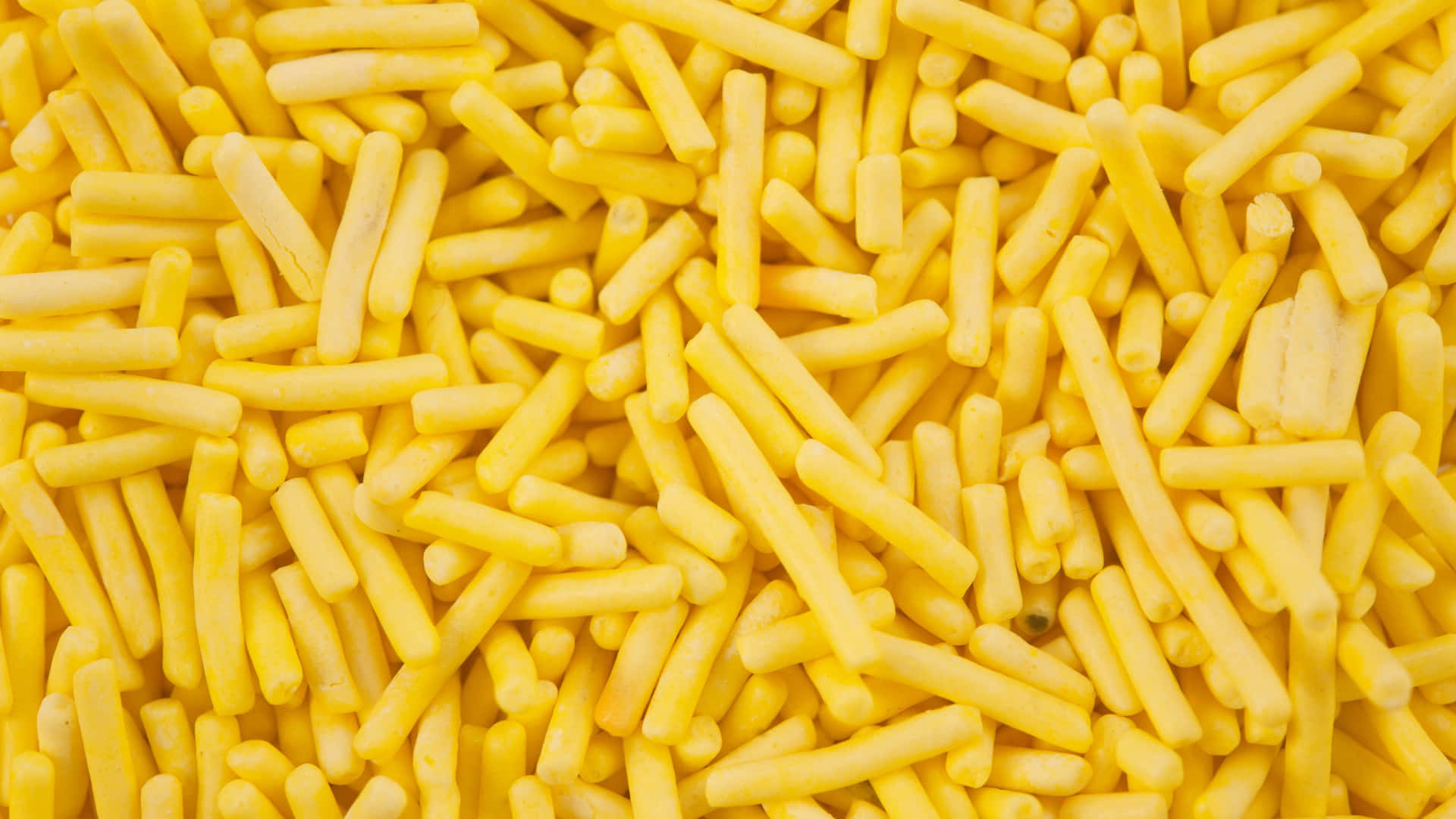 Yellow Sprinkles Background Wallpaper