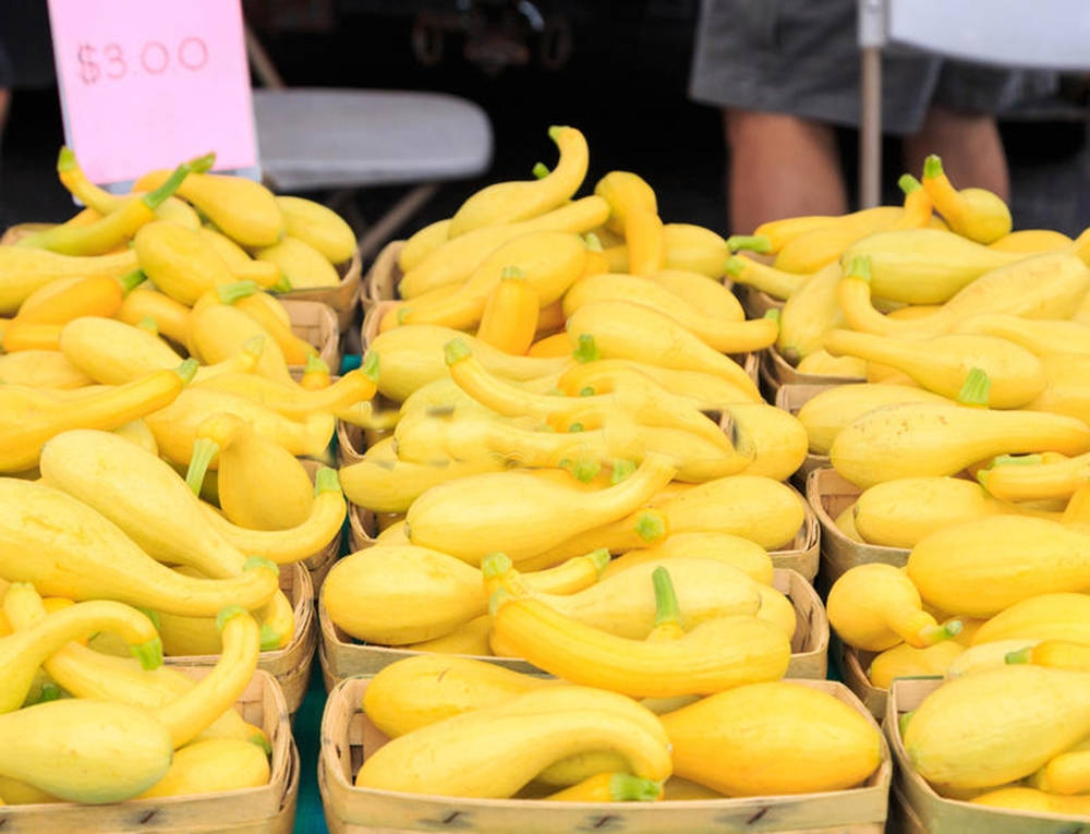 Yellow Squash Fruits In The Market Background
