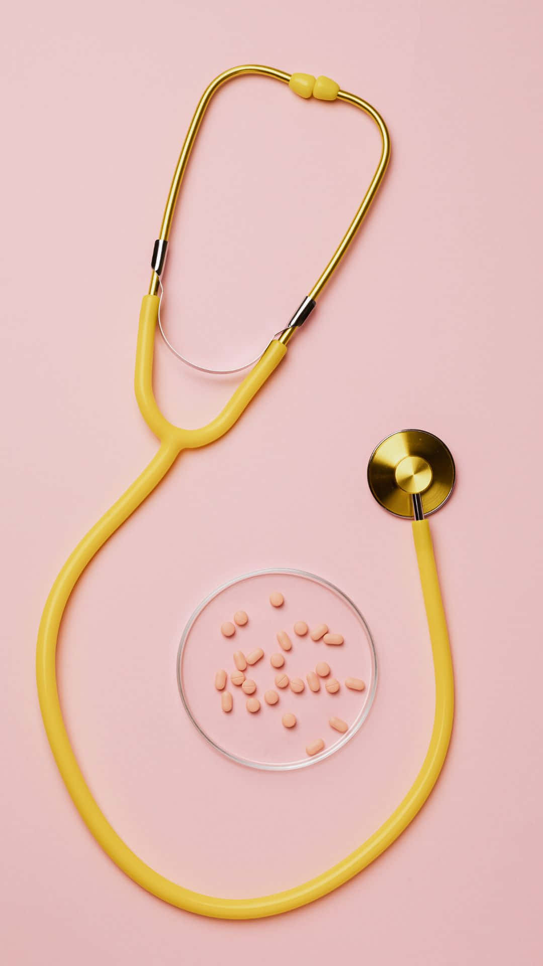 Yellow Stethoscope Pink Pills Pink Background Wallpaper