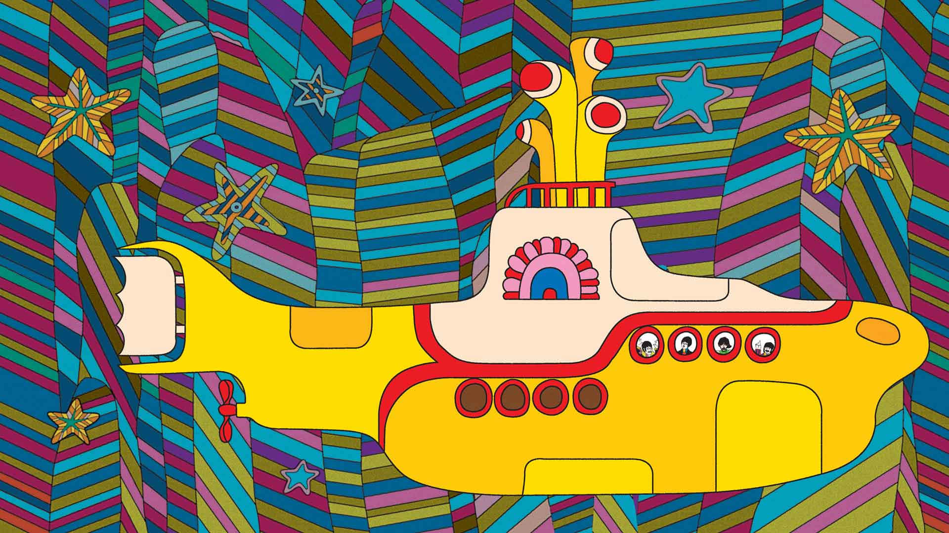 Vibrant Yellow Submarine Surrounded by Sea Life Wallpaper