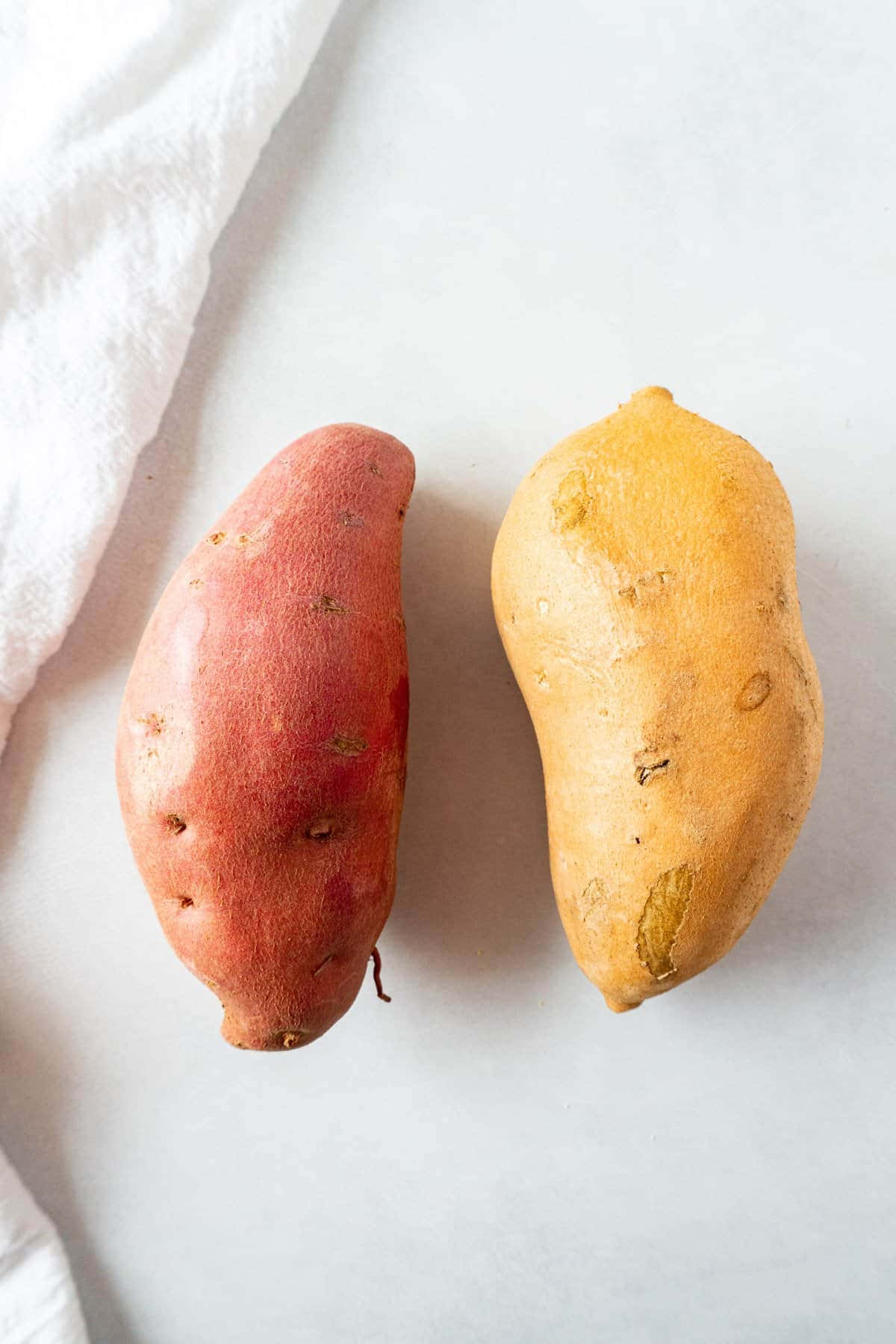 Delicious Yellow Sweet Potatoes in a Rustic Setting Wallpaper