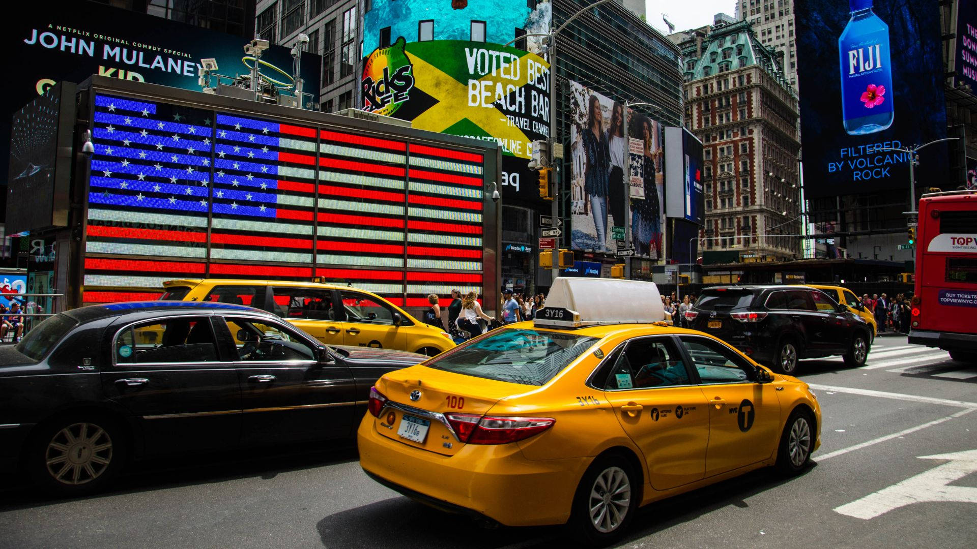 Yellow Taxi Cab In New York City Time Square Wallpaper