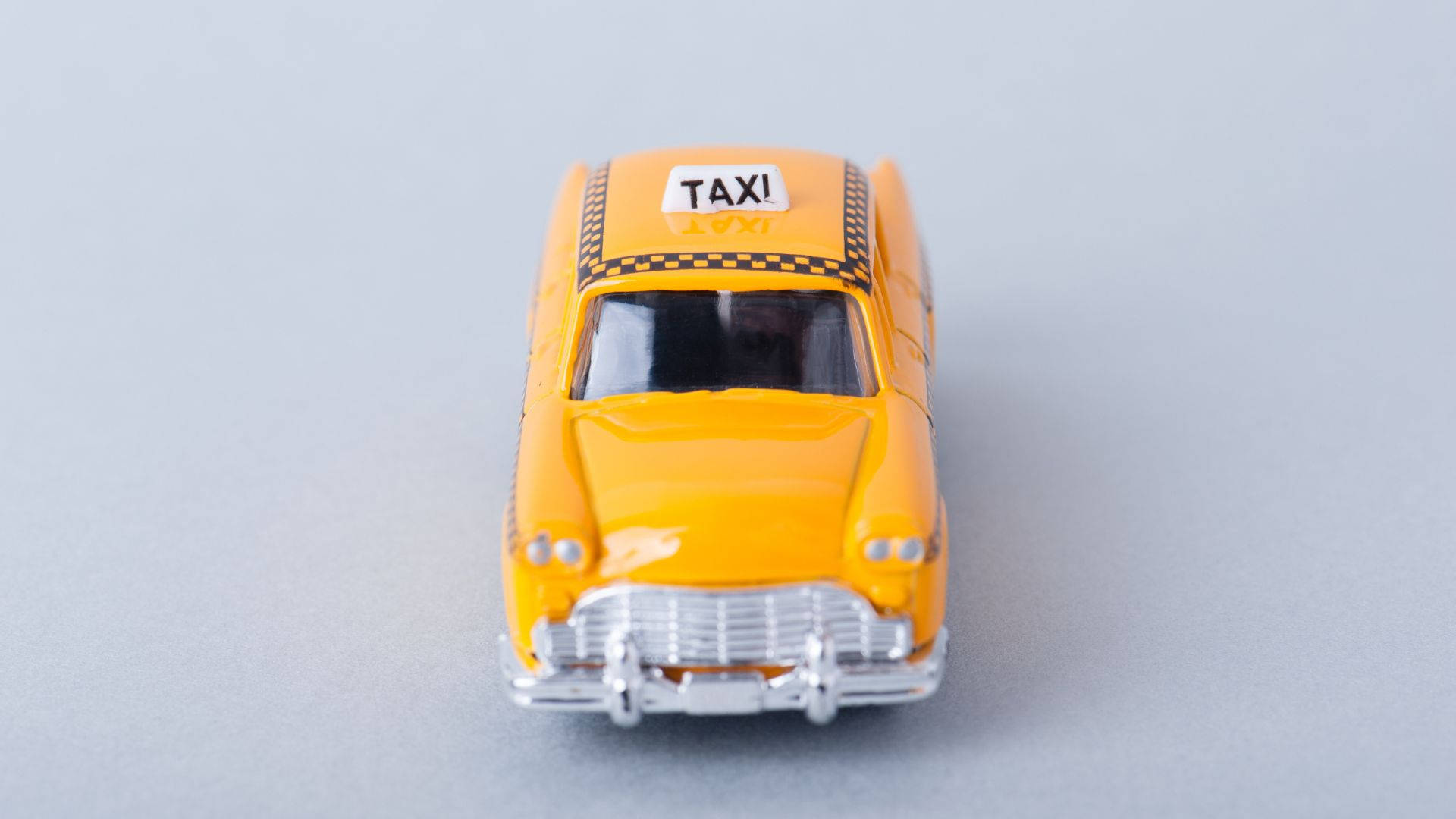 Yellow Taxi Toy Car Wallpaper
