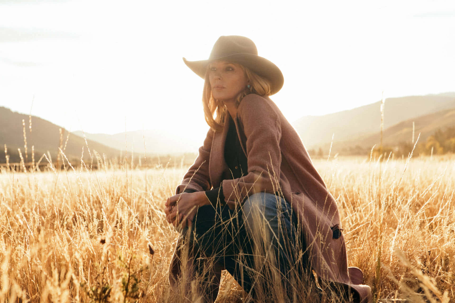 Yellowstone Beth Dutton On A Field Background