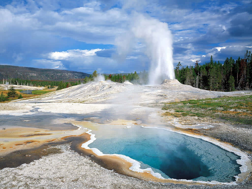 Breathtaking View of Erupting Geysers in Yellowstone National Park Wallpaper